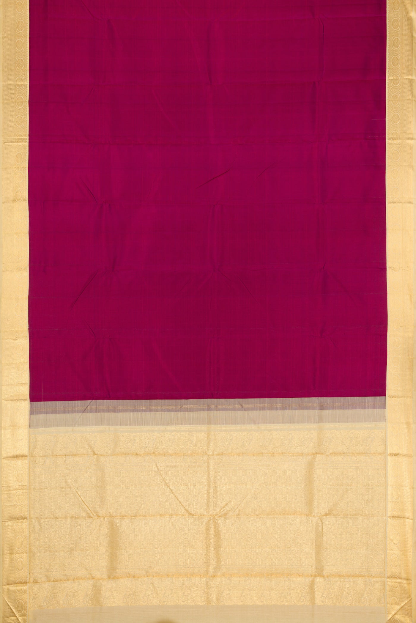 Flat view of Burgundy Dual Tone Kanjivaram Silk Saree with Plain Body and Zari Border. 