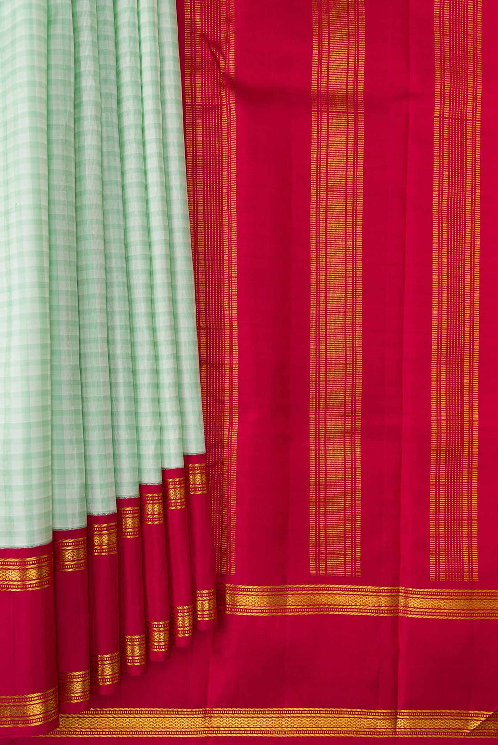 Pleats and pallu of Pista Green Dual Tone Kanjivaram Silk Saree with Checked design on the body and Zari Border. 
