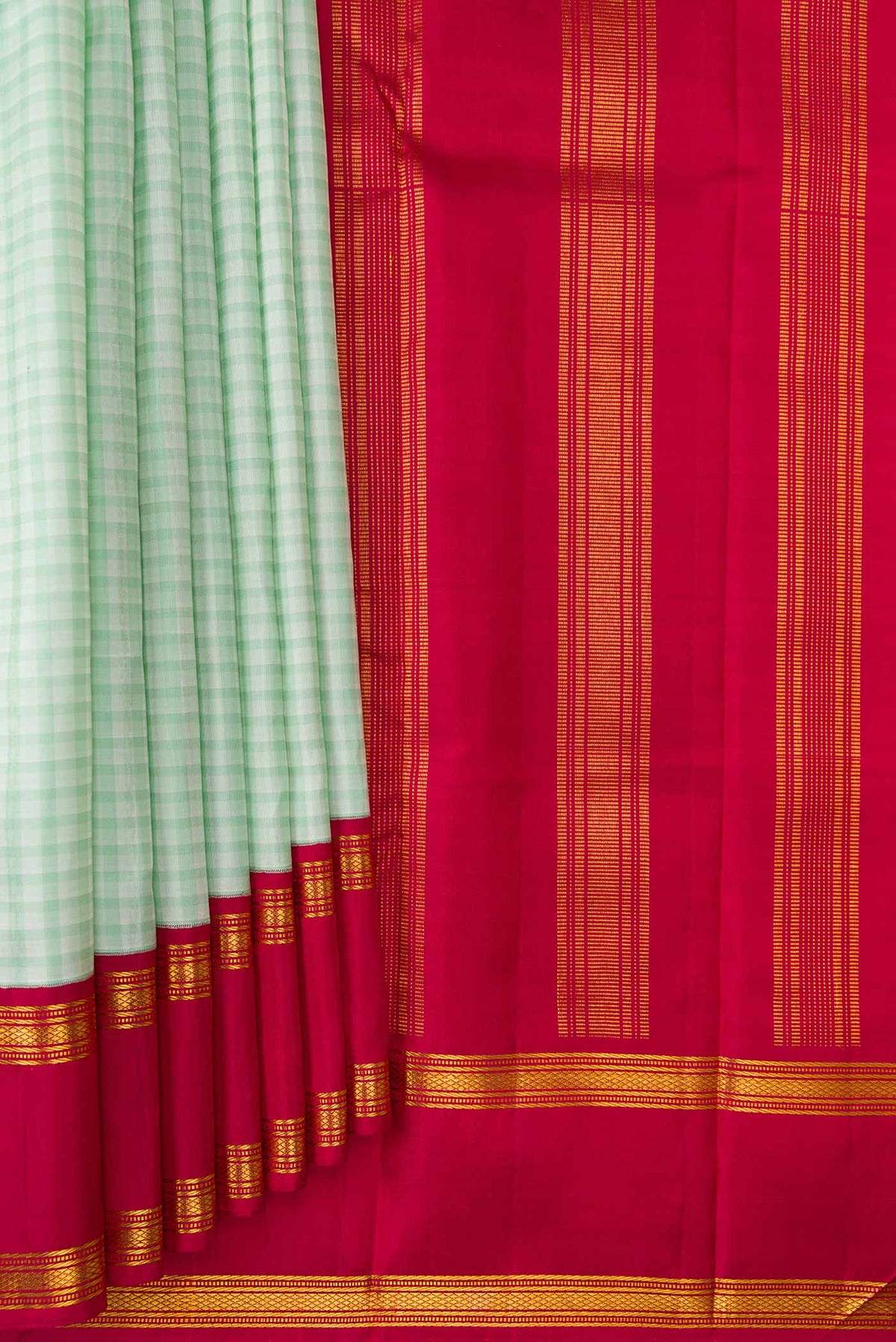 Pleats and pallu of Pista Green Dual Tone Kanjivaram Silk Saree with Checked design on the body and Zari Border. 