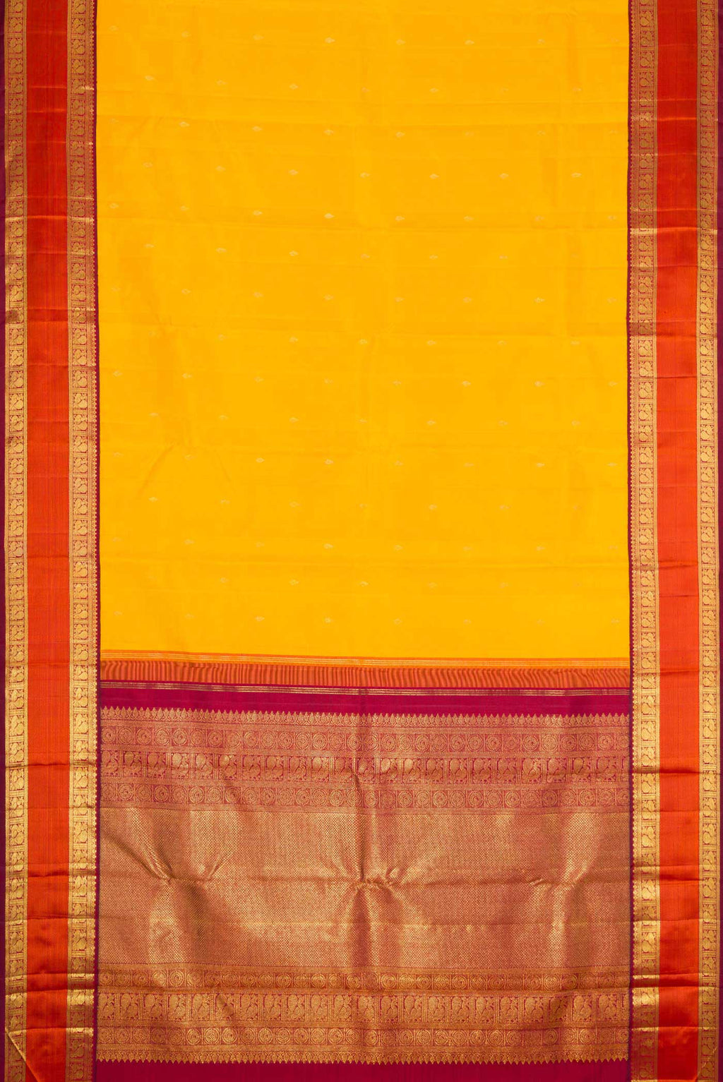 Flat view of Pure Silk Pure Zari Mustard Dual Tone Kanchipuram Saree with Zari Butta on the body and Zari And Thread Border