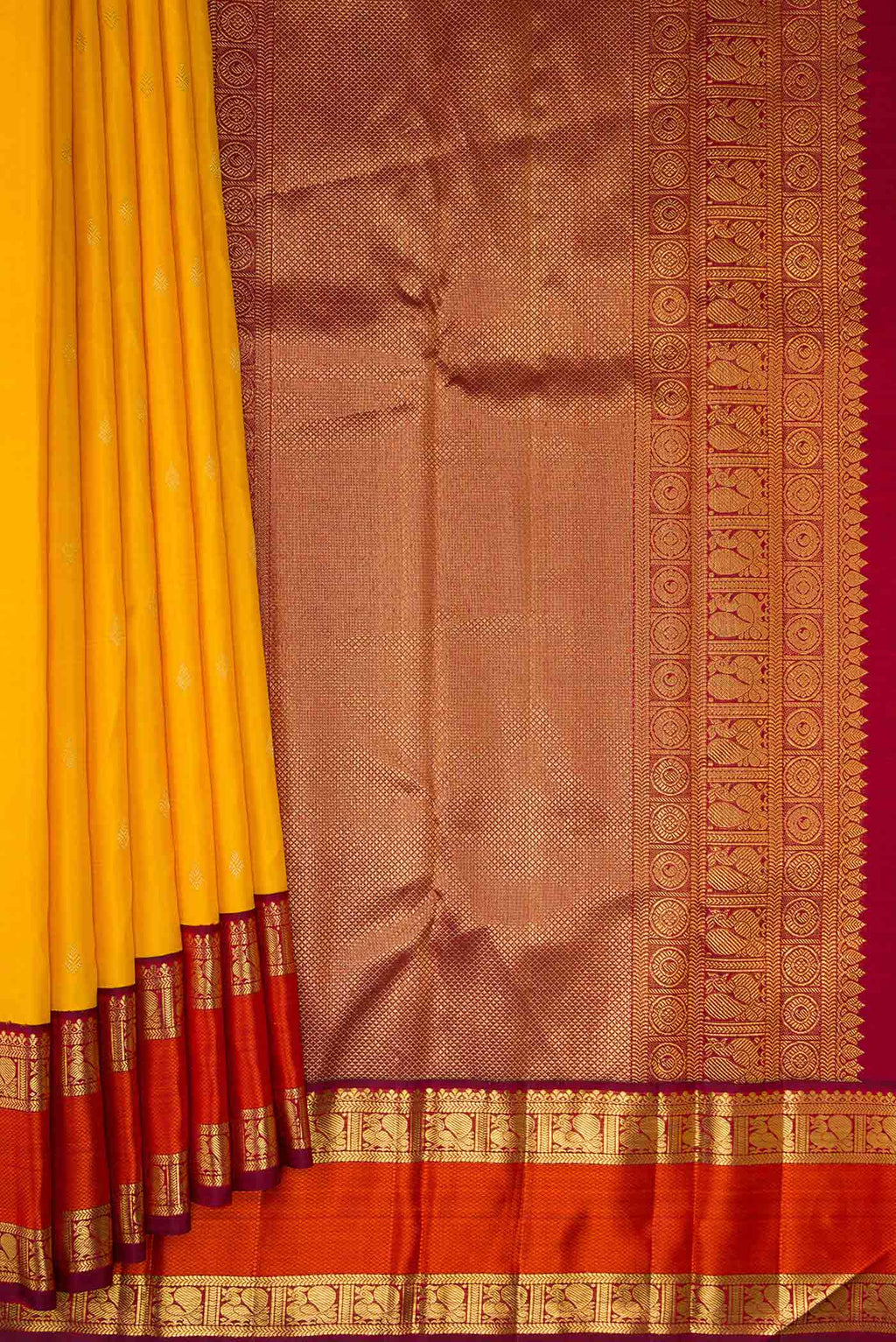 Pleats and pallu of Pure Silk Pure Zari Mustard Dual Tone Kanchipuram Saree with Zari Butta on the body and Zari And Thread Border