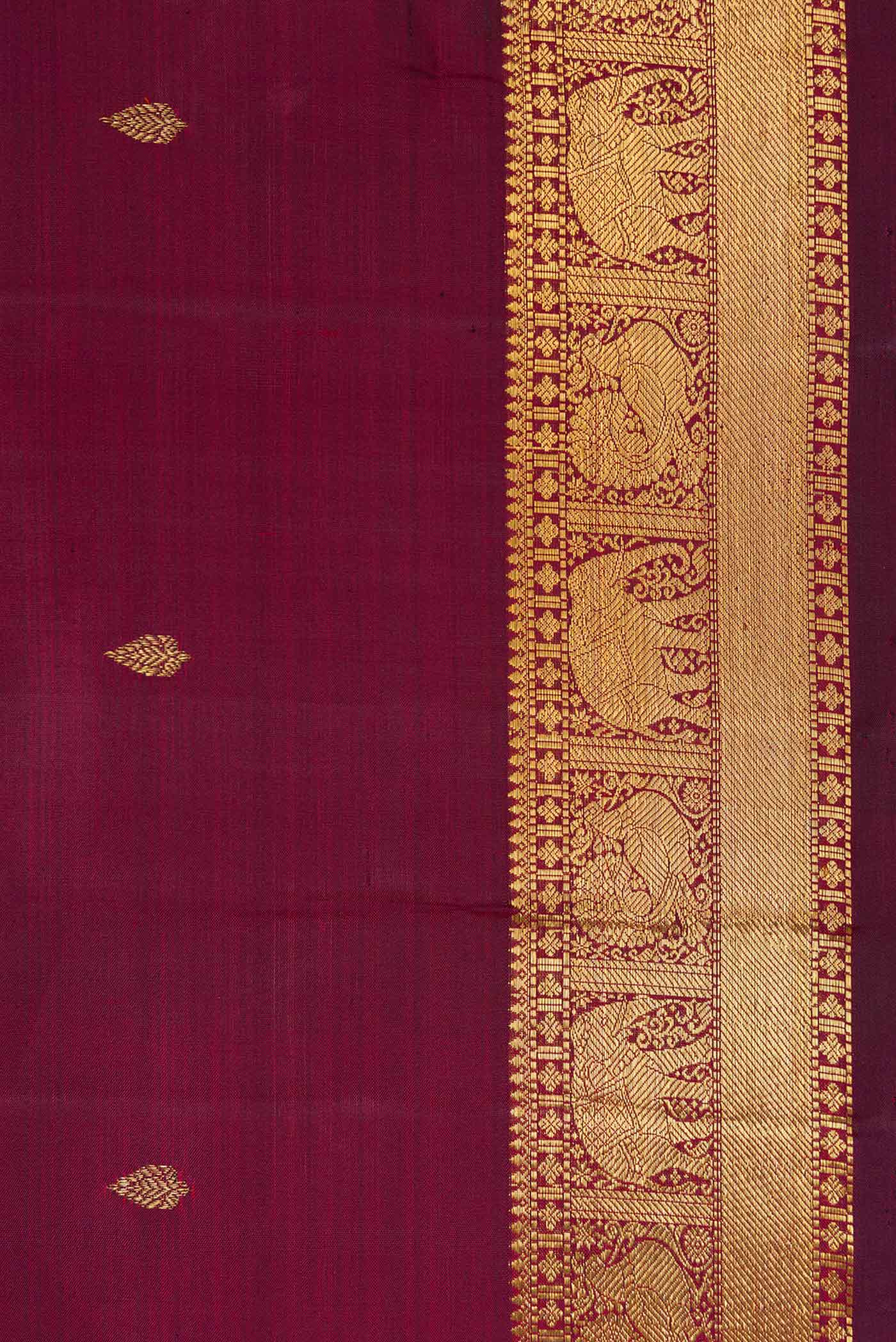 Border image of Pure Silk Pure Zari Burgundy Dual Tone Kanchipuram Saree with Zari Butta on the body and Zari Border. 