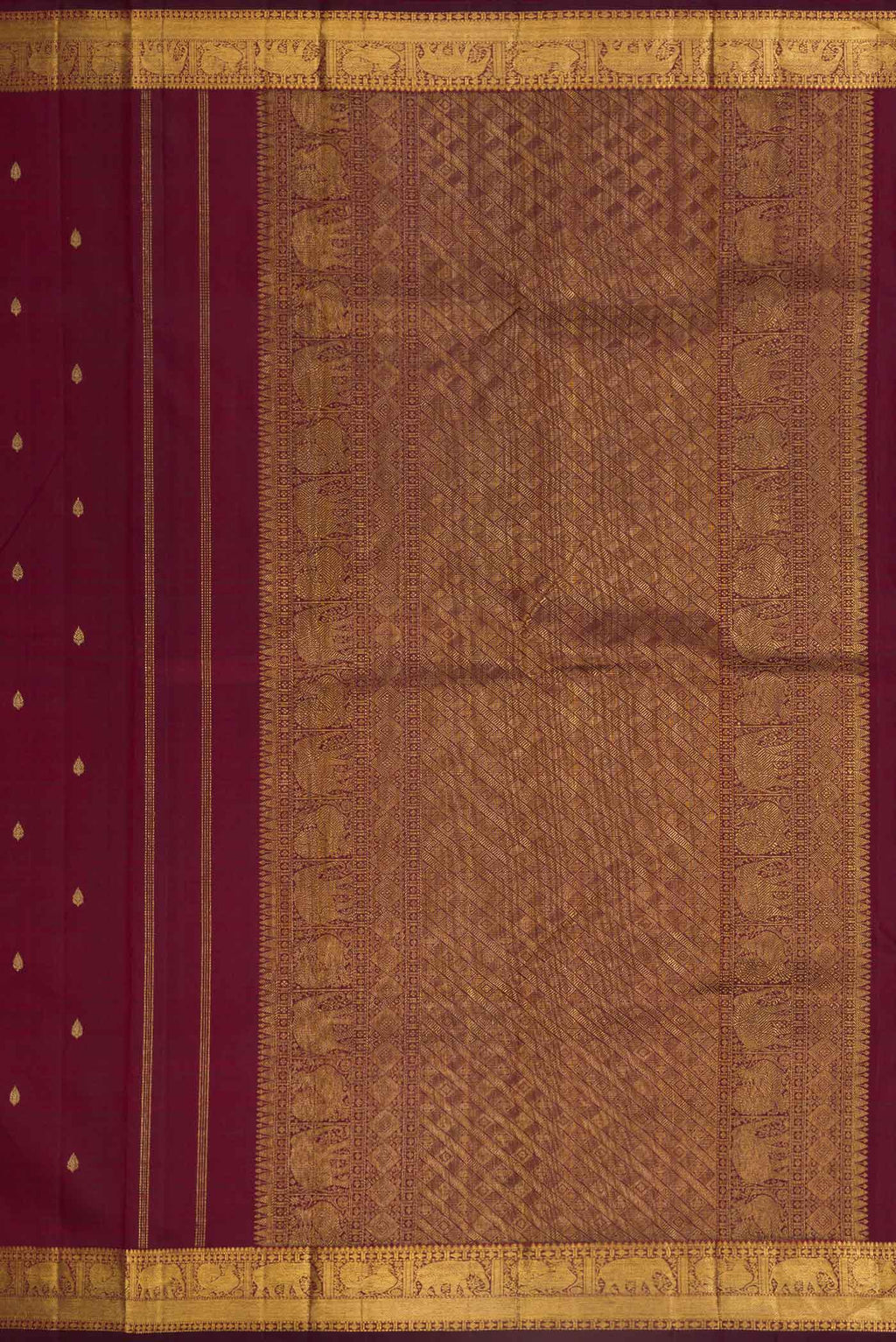 Close up image of the pallu of Pure Silk Pure Zari Burgundy Dual Tone Kanchipuram Saree with Zari Butta on the body and Zari Border. 