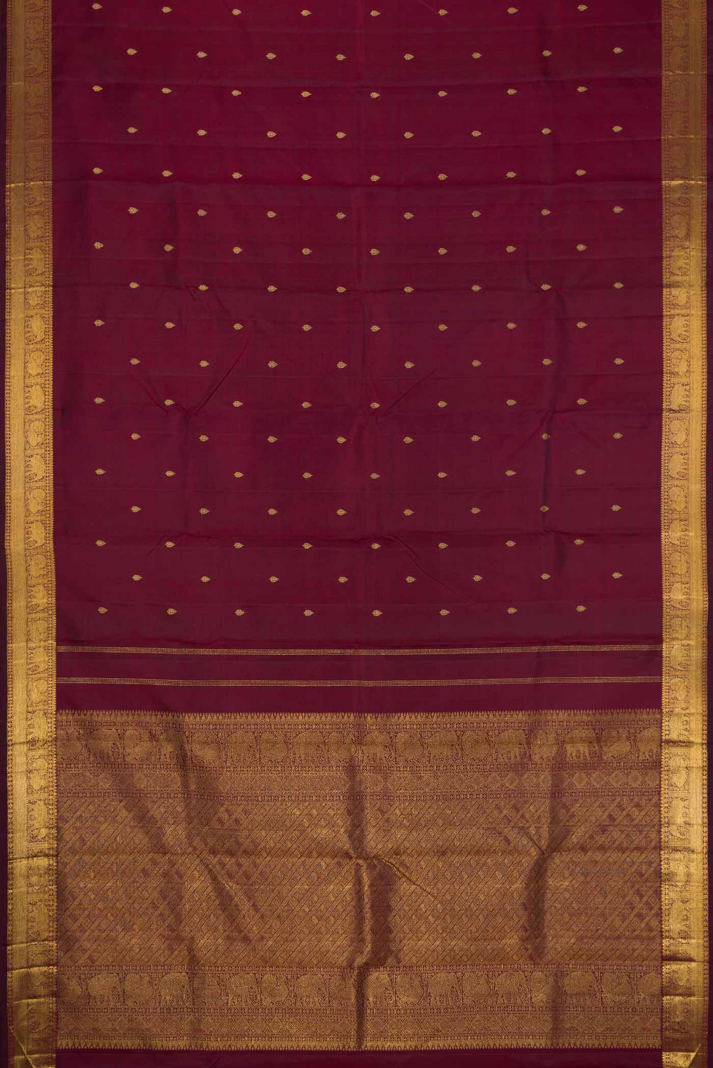 Flat view of Pure Silk Pure Zari Burgundy Dual Tone Kanchipuram Saree with Zari Butta on the body and Zari Border. 