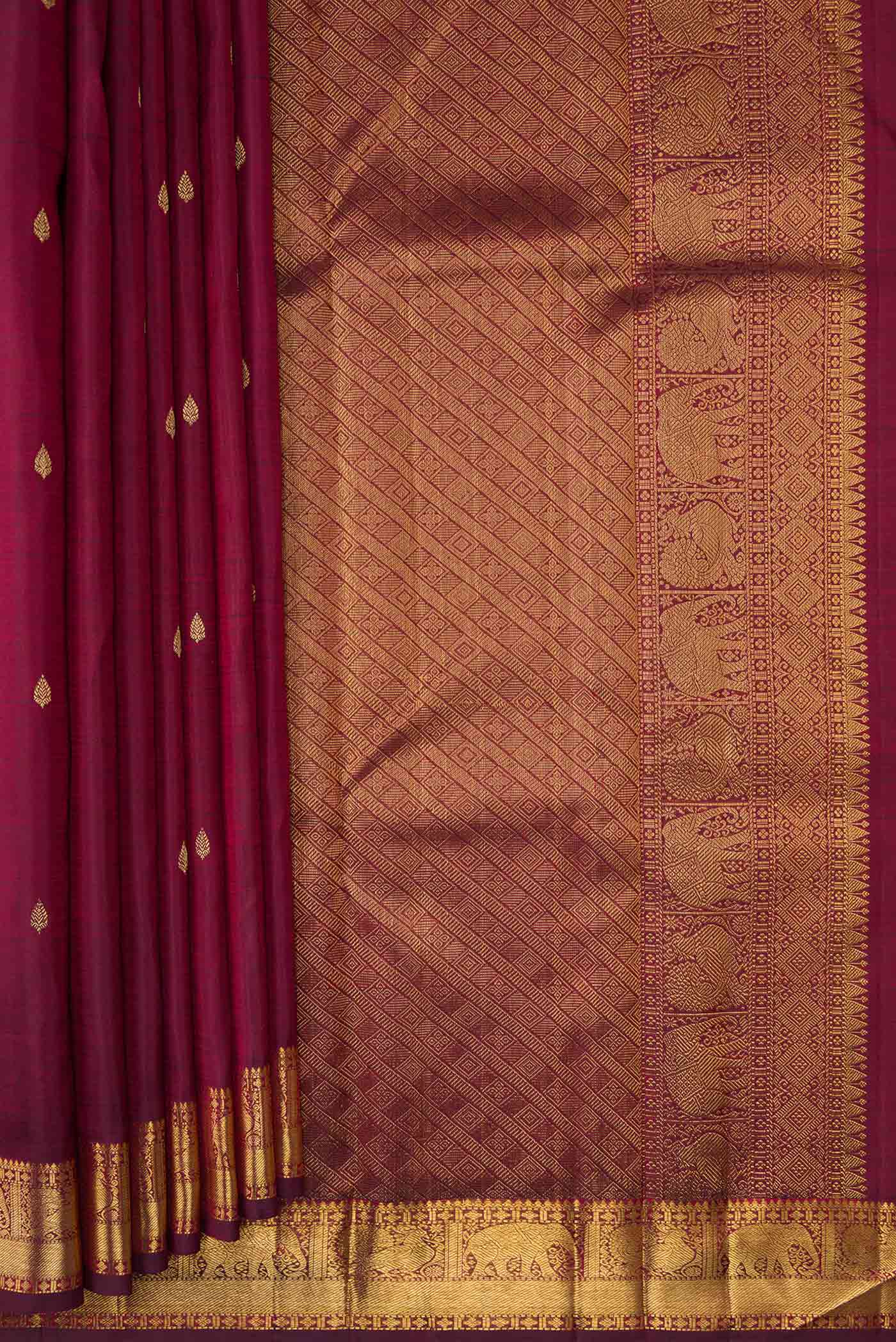 Pleats and pallu of Pure Silk Pure Zari Burgundy Dual Tone Kanchipuram Saree with Zari Butta on the body and Zari Border. 