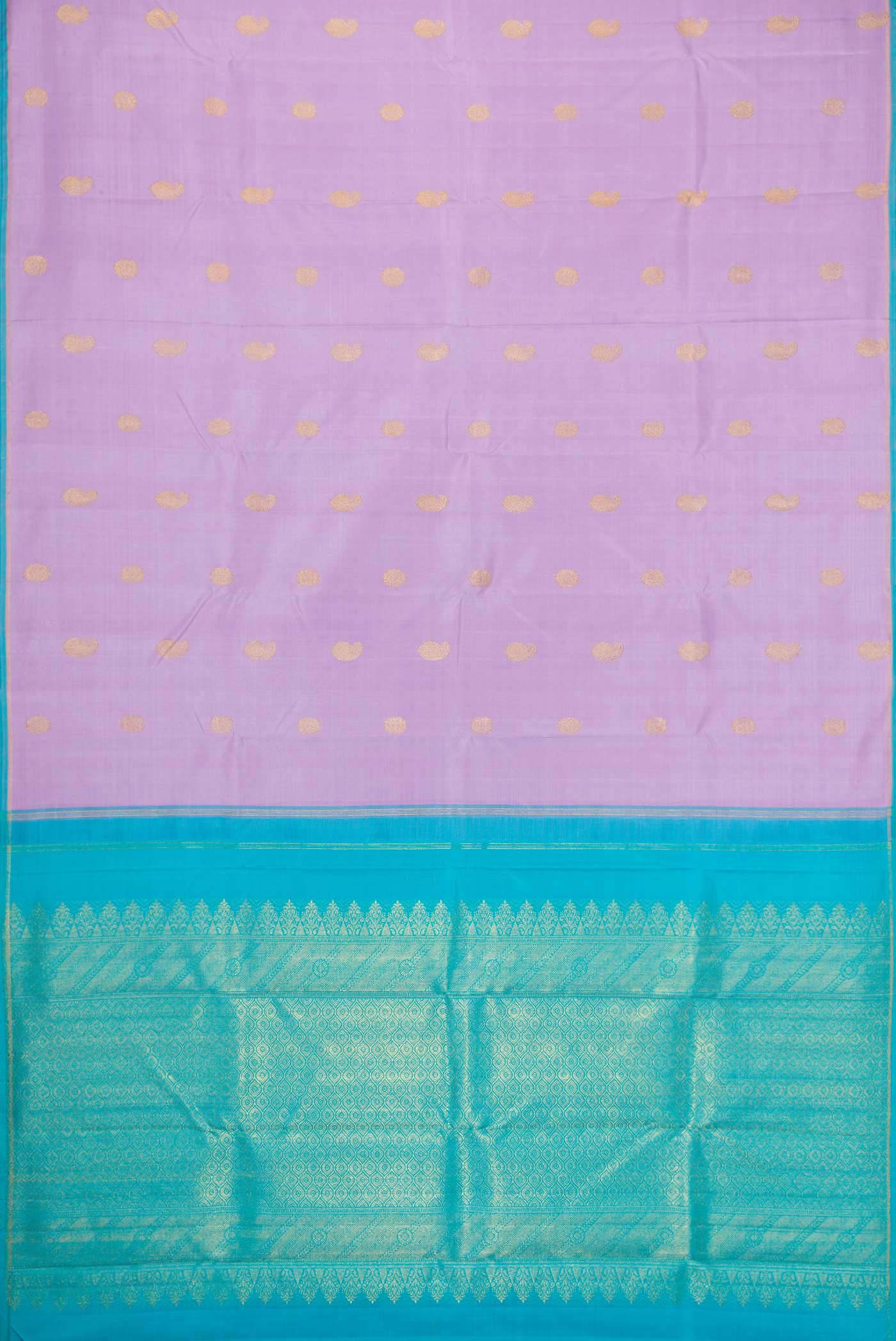 Flat view of Pure Silk Pure Zari Lavender Dual Tone Kanchipuram Saree with Zari Butta on the body and Thin Zari Line. 