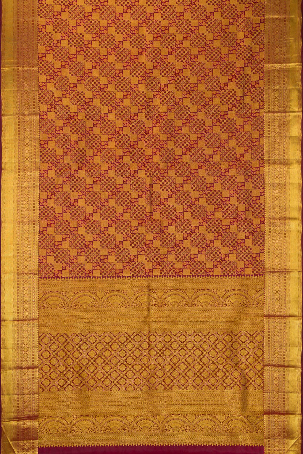 Flat view of Maroon Dual Tone Kanjivaram Silk Saree with Zari Brocade on the body and Zari Border. 