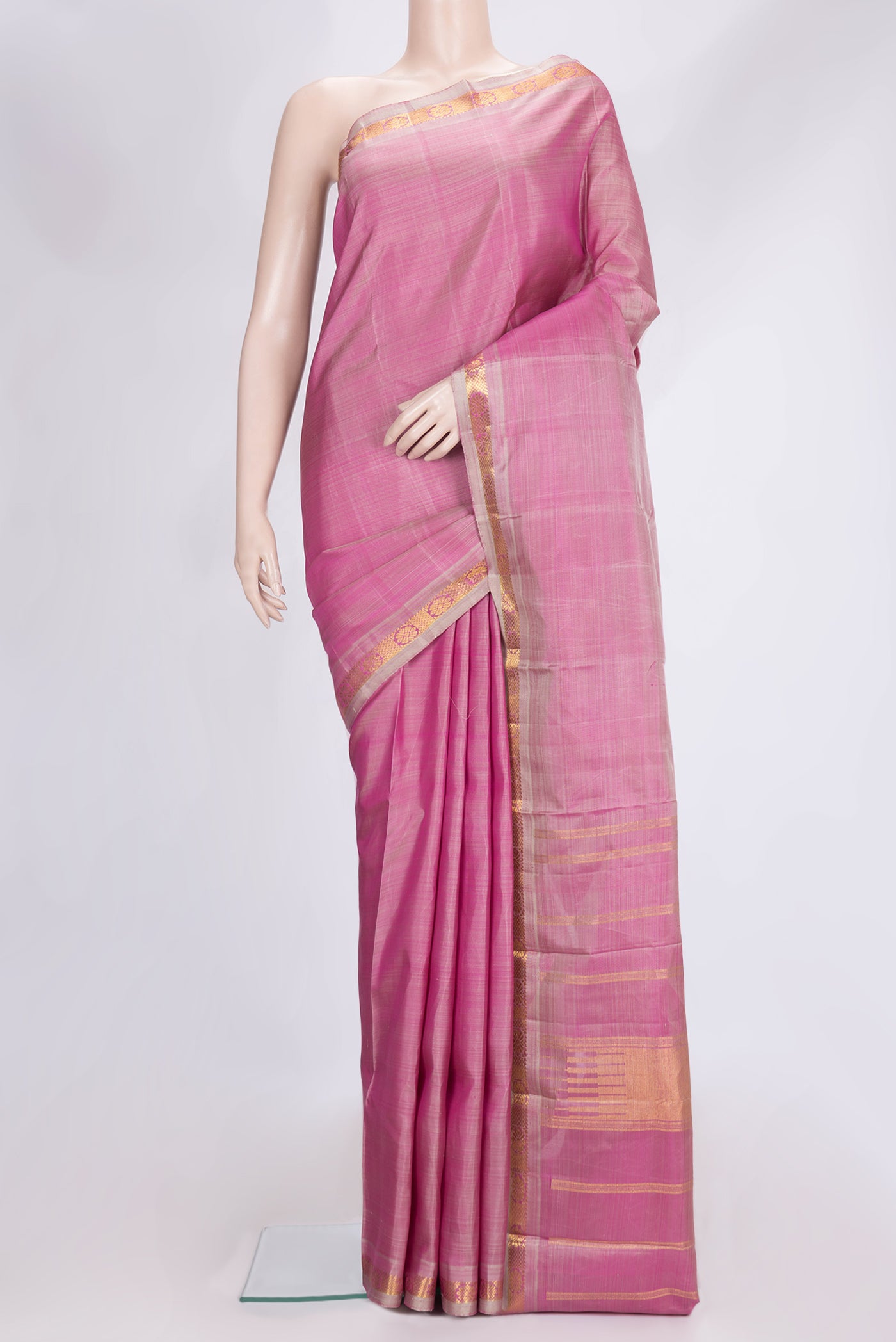Pink Dual Tone Kanchipuram Silk Saree with Plain Body and Zari Border.  displayed on a mannequin