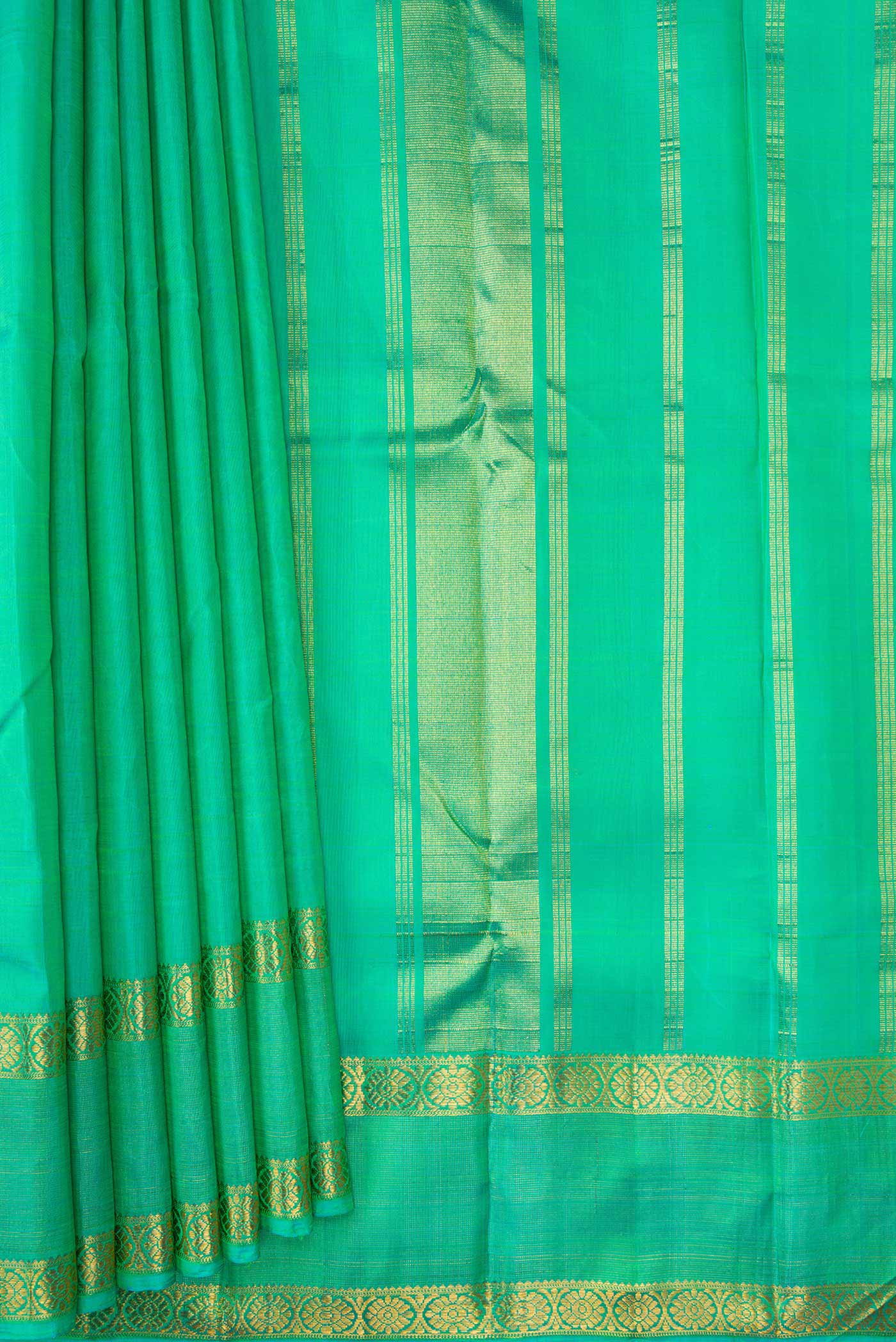 Pleats and pallu of Sea Green Dual Tone Kanchipuram Silk Saree with Plain Body and Zari Border. 