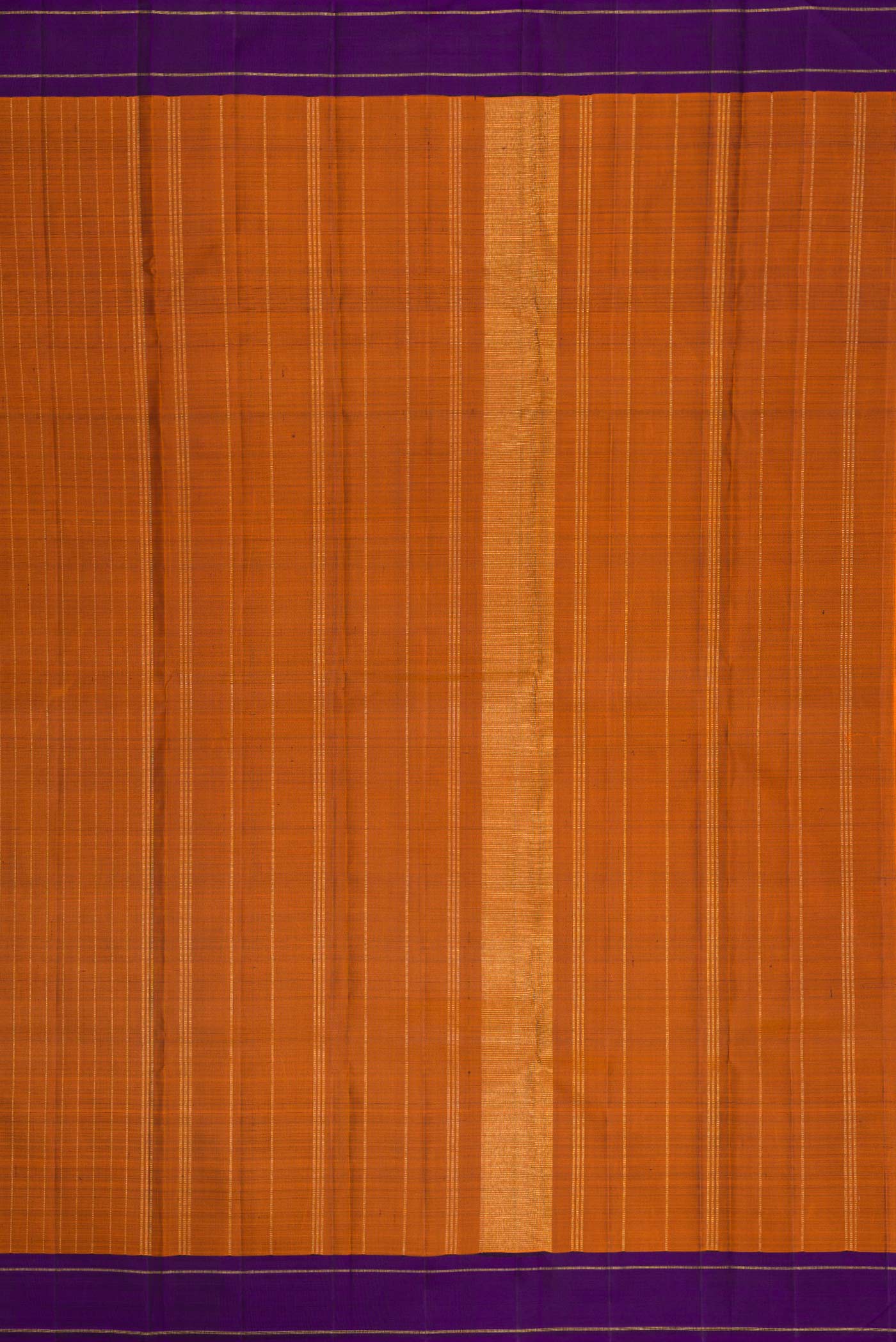 Close up image of the pallu of Orange Dual Tone Kanjivaram Silk Saree with Stripes on the body and Zari Border. 