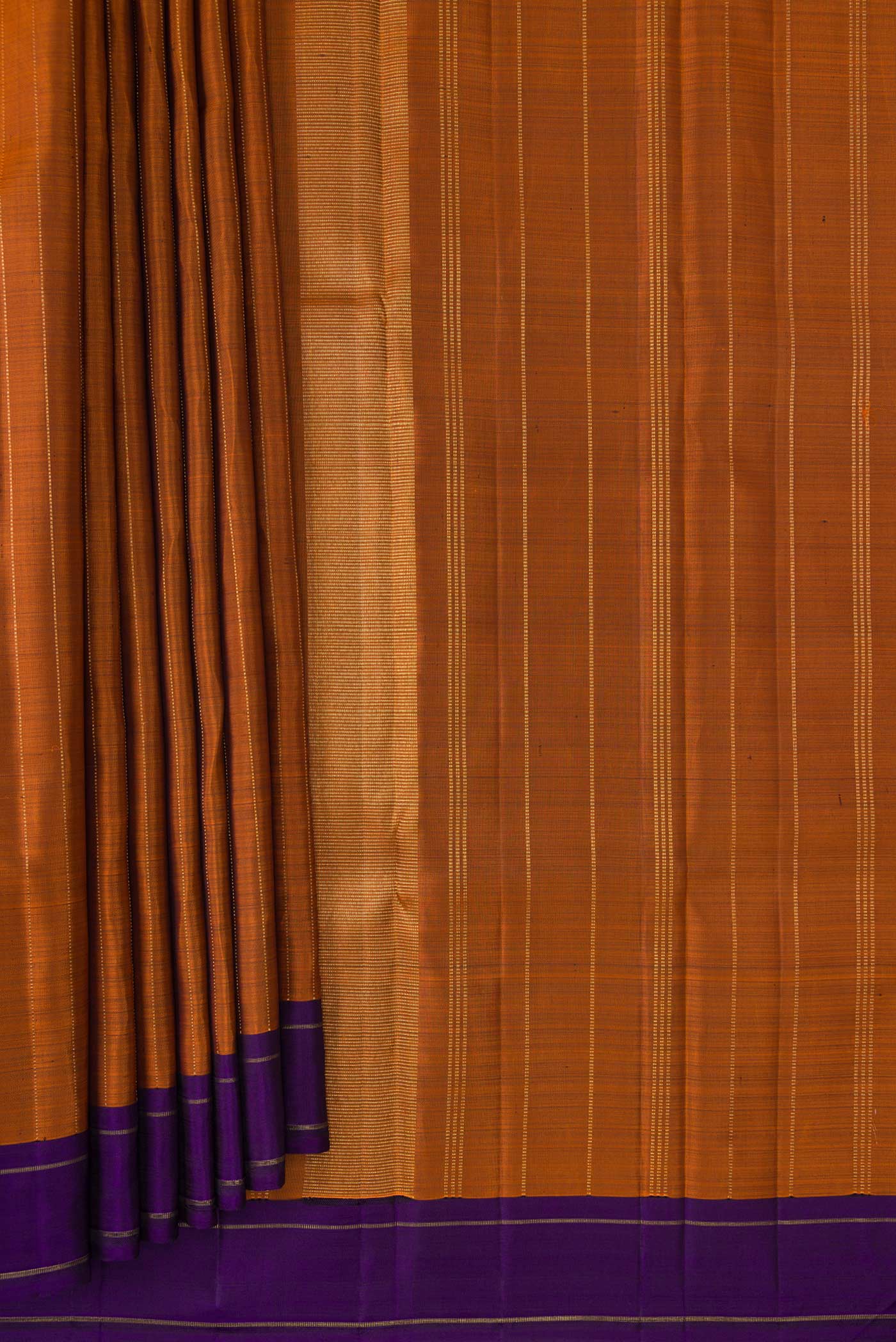 Pleats and pallu of Orange Dual Tone Kanjivaram Silk Saree with Stripes on the body and Zari Border. 