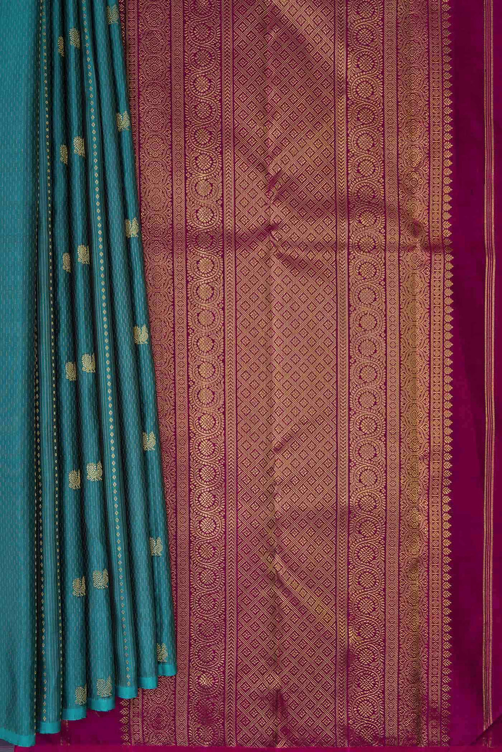 Pleats and pallu of Maya Blue Dual Tone Kanchipuram Silk Saree with Zari Butta on the body and Zari Border