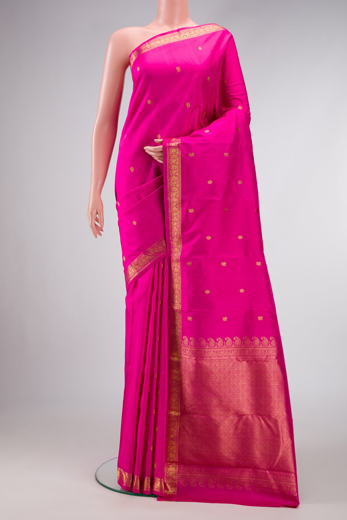 Pink Dual Tone Kanchipuram Silk Saree with Zari Butta on the body and Zari Border.  displayed on a mannequin