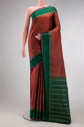 Orange Dual Tone Kanjivaram Silk Saree with Checked design on the body and Zari Border.  displayed on a mannequin