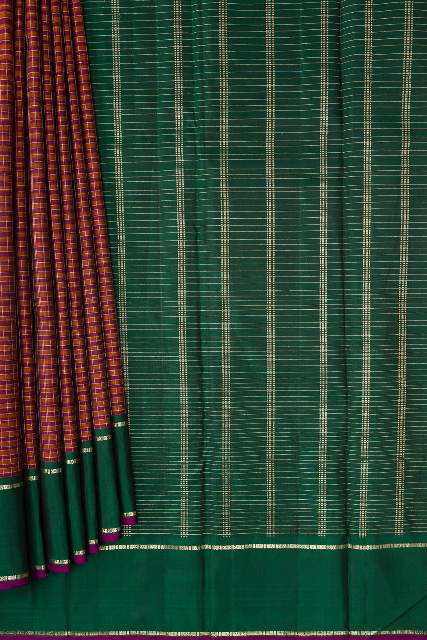 Pleats and pallu of Orange Dual Tone Kanjivaram Silk Saree with Checked design on the body and Zari Border. 