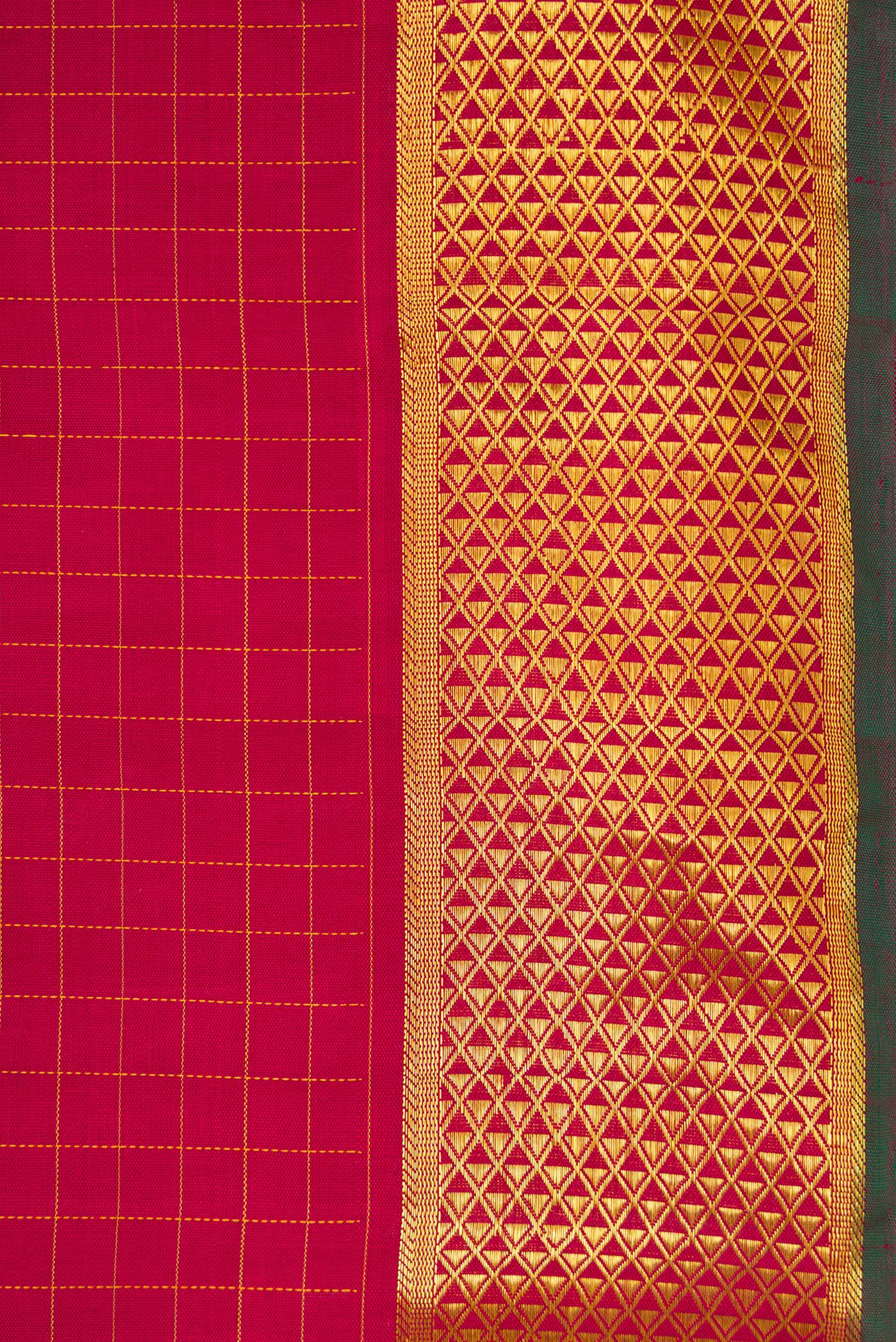 Border image of Maroon Dual Tone Kanchipuram Silk Saree with Checked design on the body and Zari Border. 