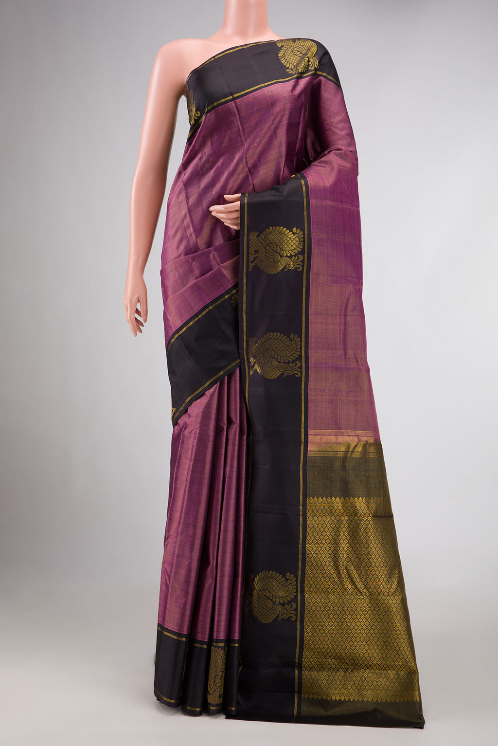 Pink Dual Tone Kanjivaram Silk Saree with Zari Butta on the body and Zari Border.  displayed on a mannequin