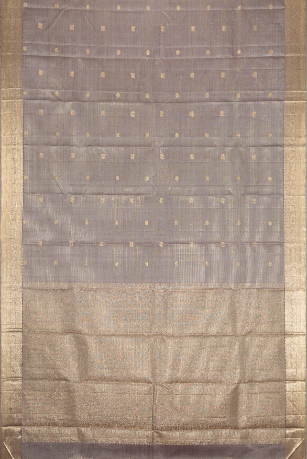 Flat view of Grey Dual Tone Kanjivaram Silk Saree with Zari Butta on the body and Zari Border. 