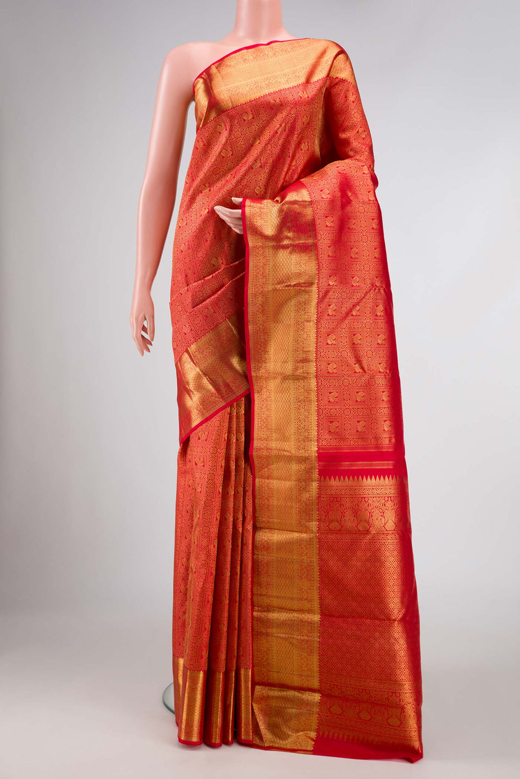 Pure Silk Pure Zari Red Dual Tone Kanchipuram Saree with Zari Brocade on the body and Zari Border displayed on a mannequin
