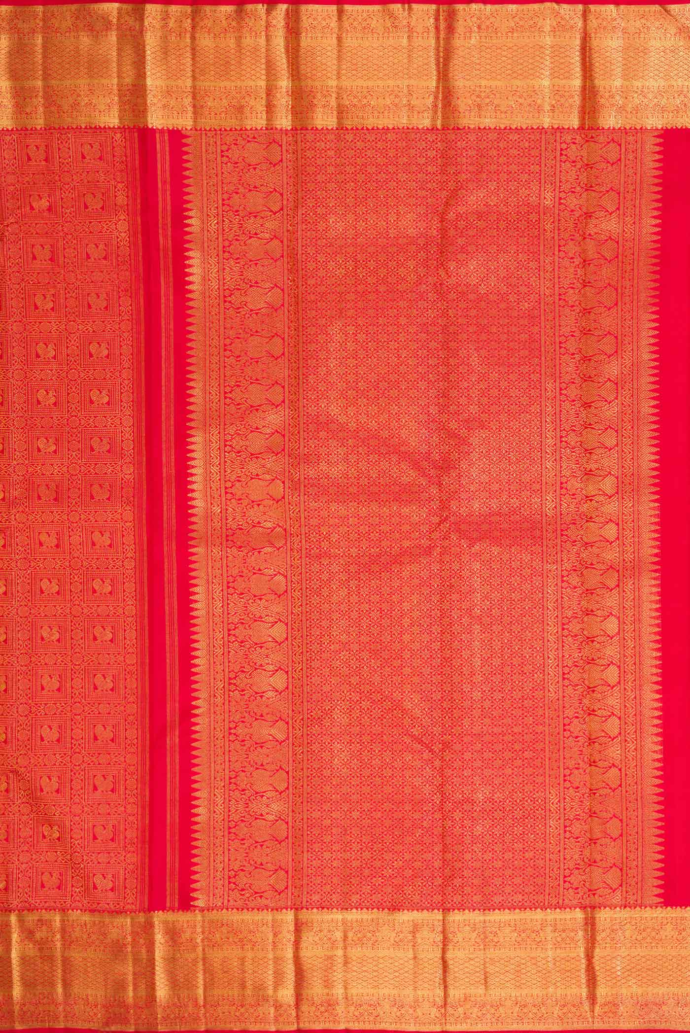 Close up image of the pallu of Pure Silk Pure Zari Red Dual Tone Kanchipuram Saree with Zari Brocade on the body and Zari Border
