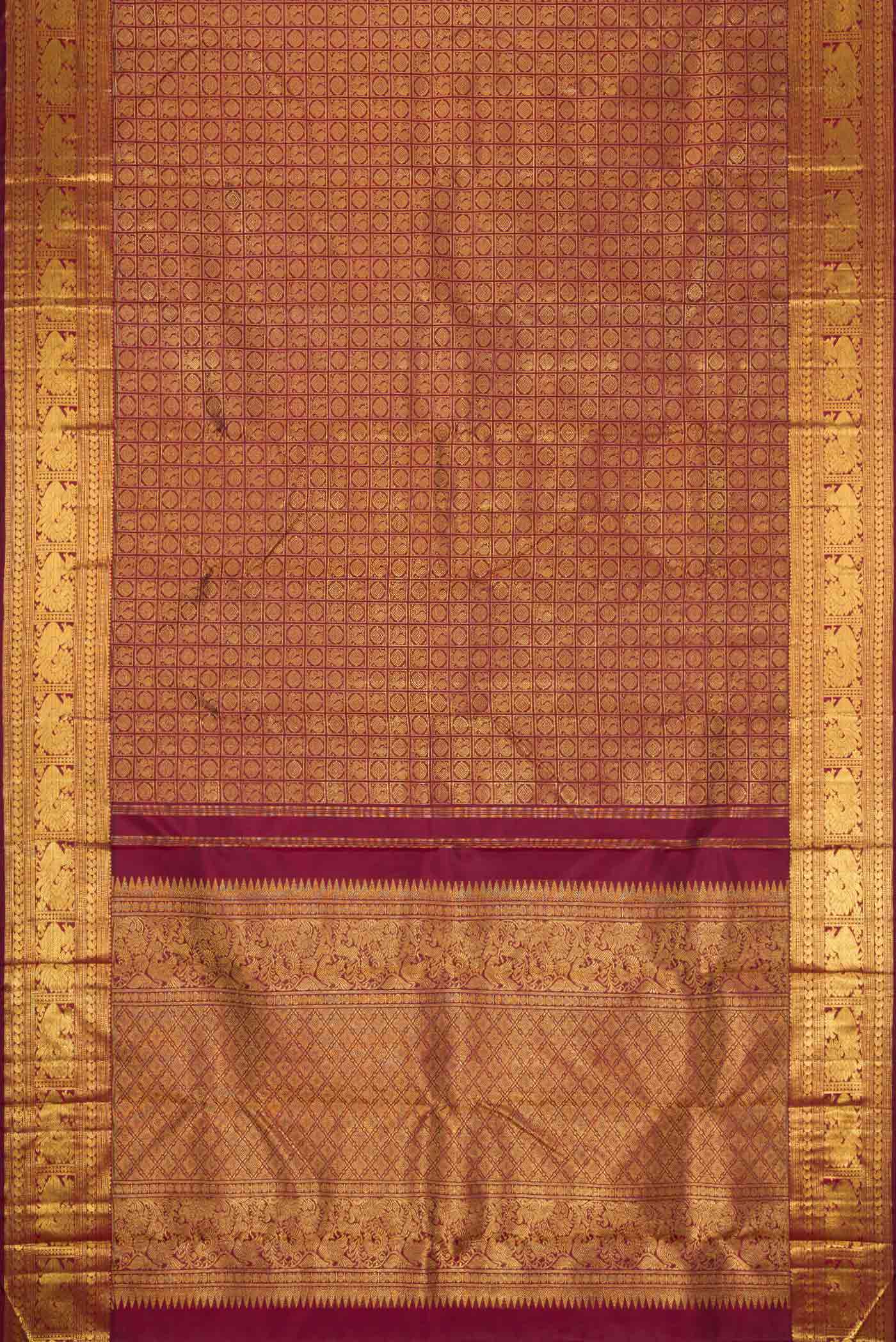 Flat view of Pure Silk Pure Zari Maroon Dual Tone Kanchipuram Saree with Zari Brocade on the body and Zari Border