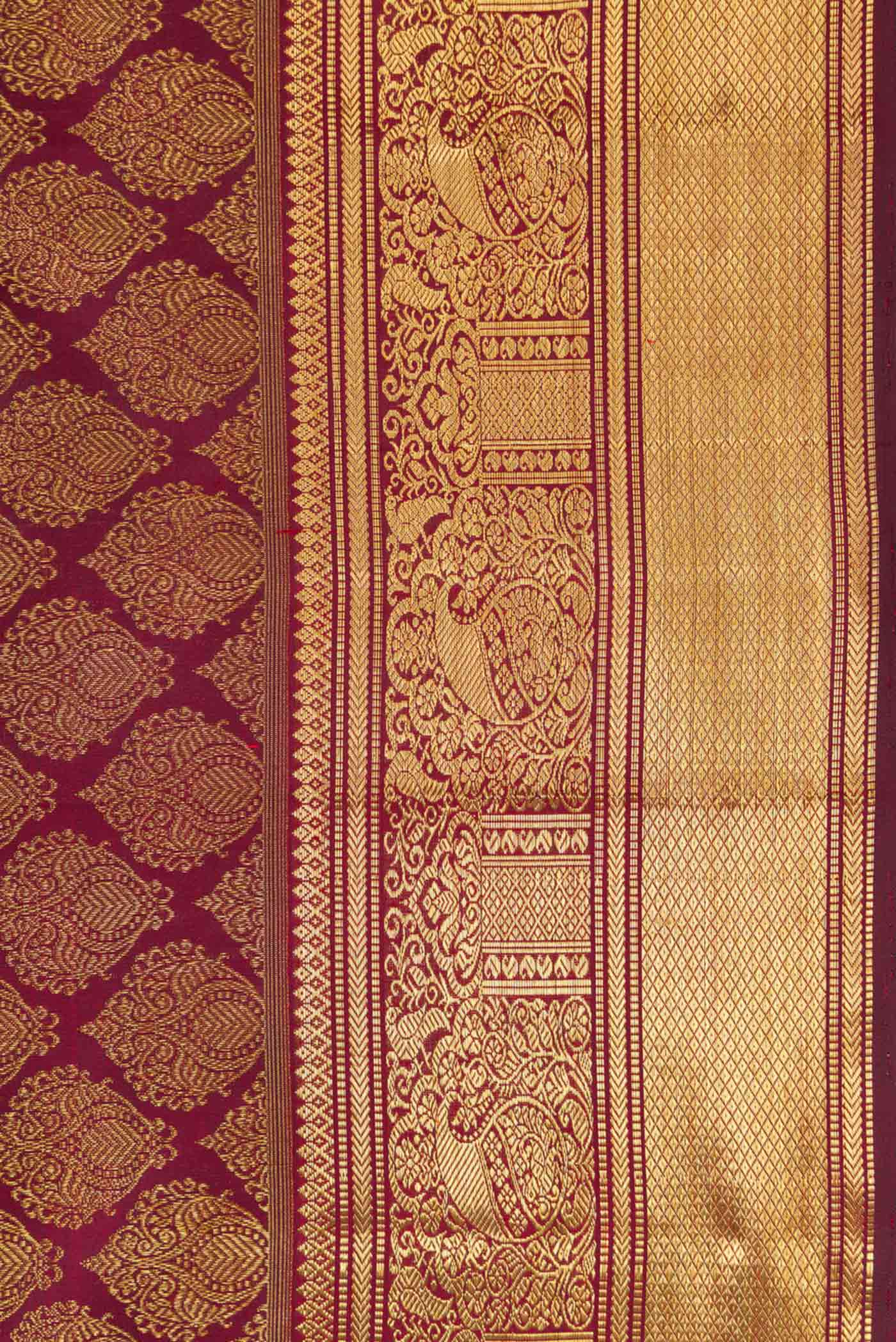 Border image of Pure Silk Pure Zari Maroon Dual Tone Kanchipuram Saree with Zari Brocade on the body and Zari Border
