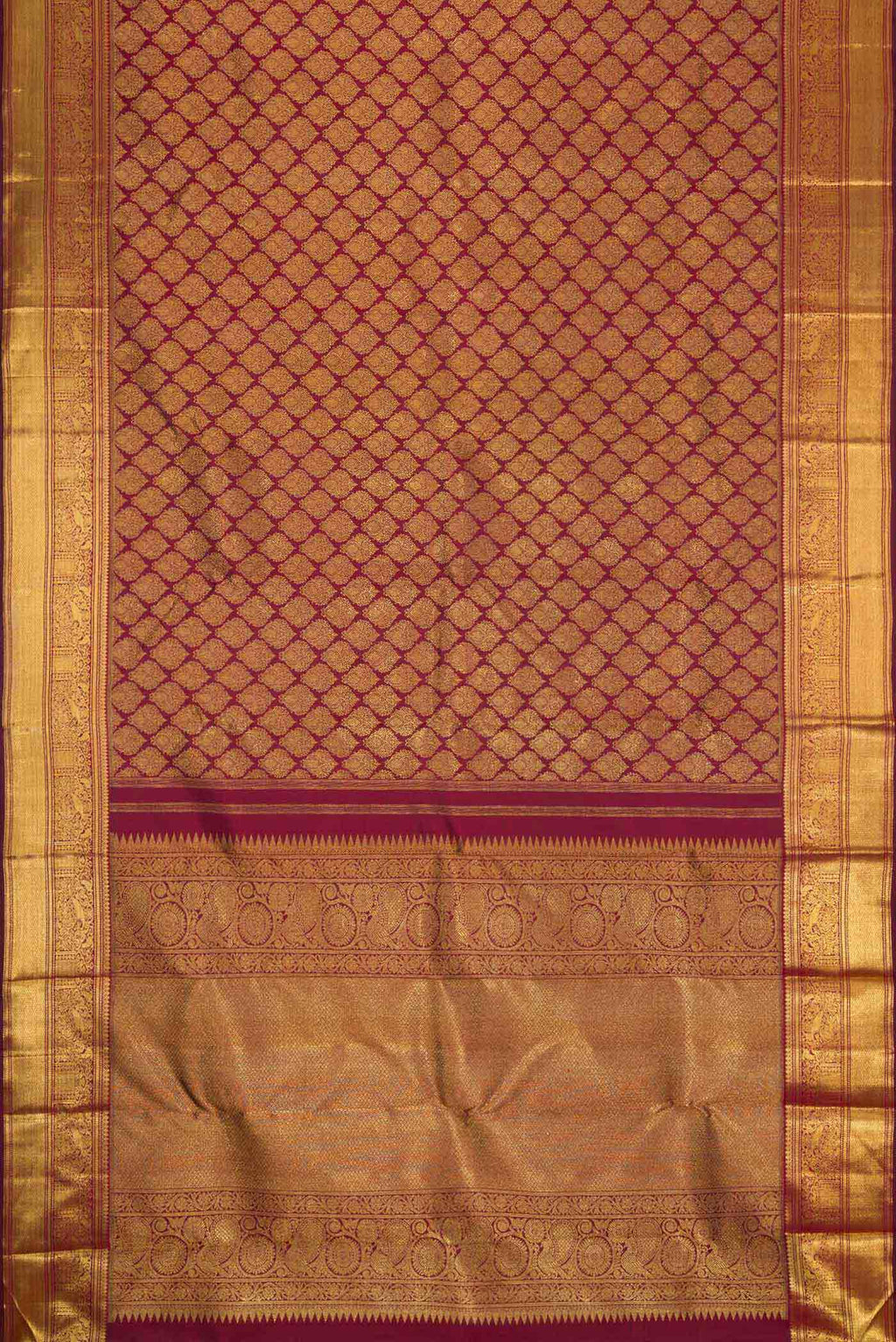 Flat view of Pure Silk Pure Zari Maroon Dual Tone Kanchipuram Saree with Zari Brocade on the body and Zari Border