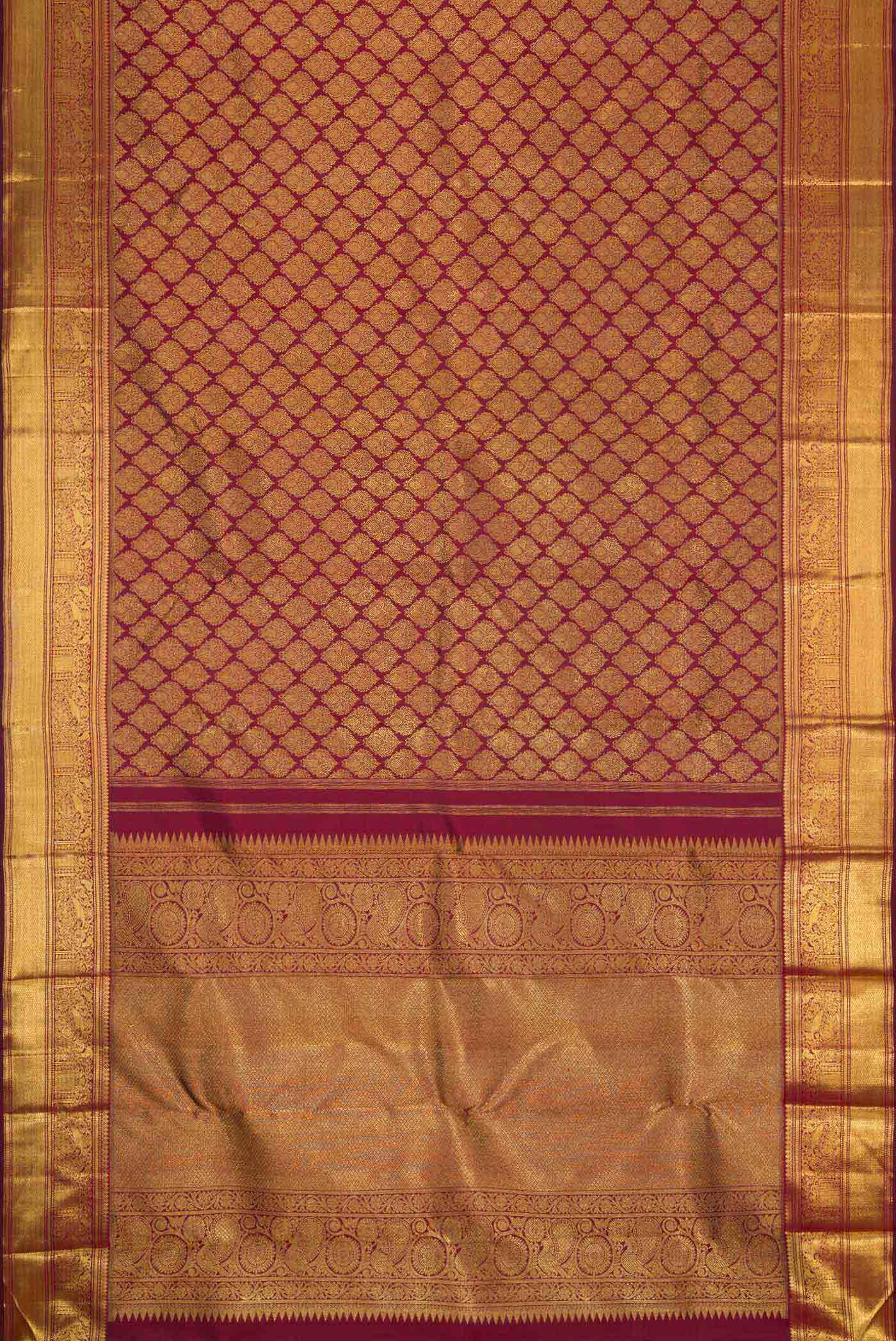 Flat view of Pure Silk Pure Zari Maroon Dual Tone Kanchipuram Saree with Zari Brocade on the body and Zari Border