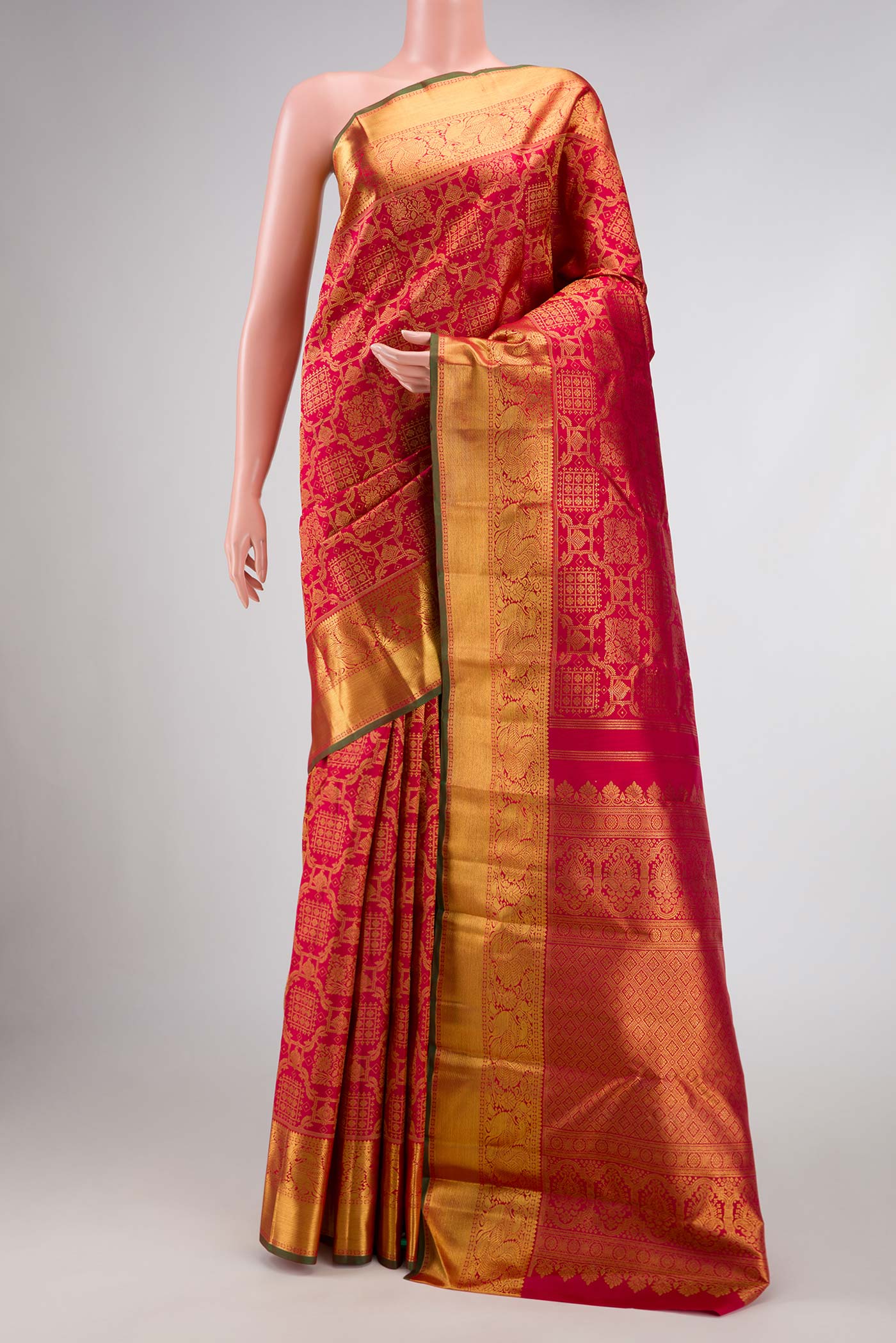 Pure Silk Pure Zari Dark Pink Dual Tone Kanchipuram Saree with Zari Brocade on the body and Zari Border displayed on a mannequin