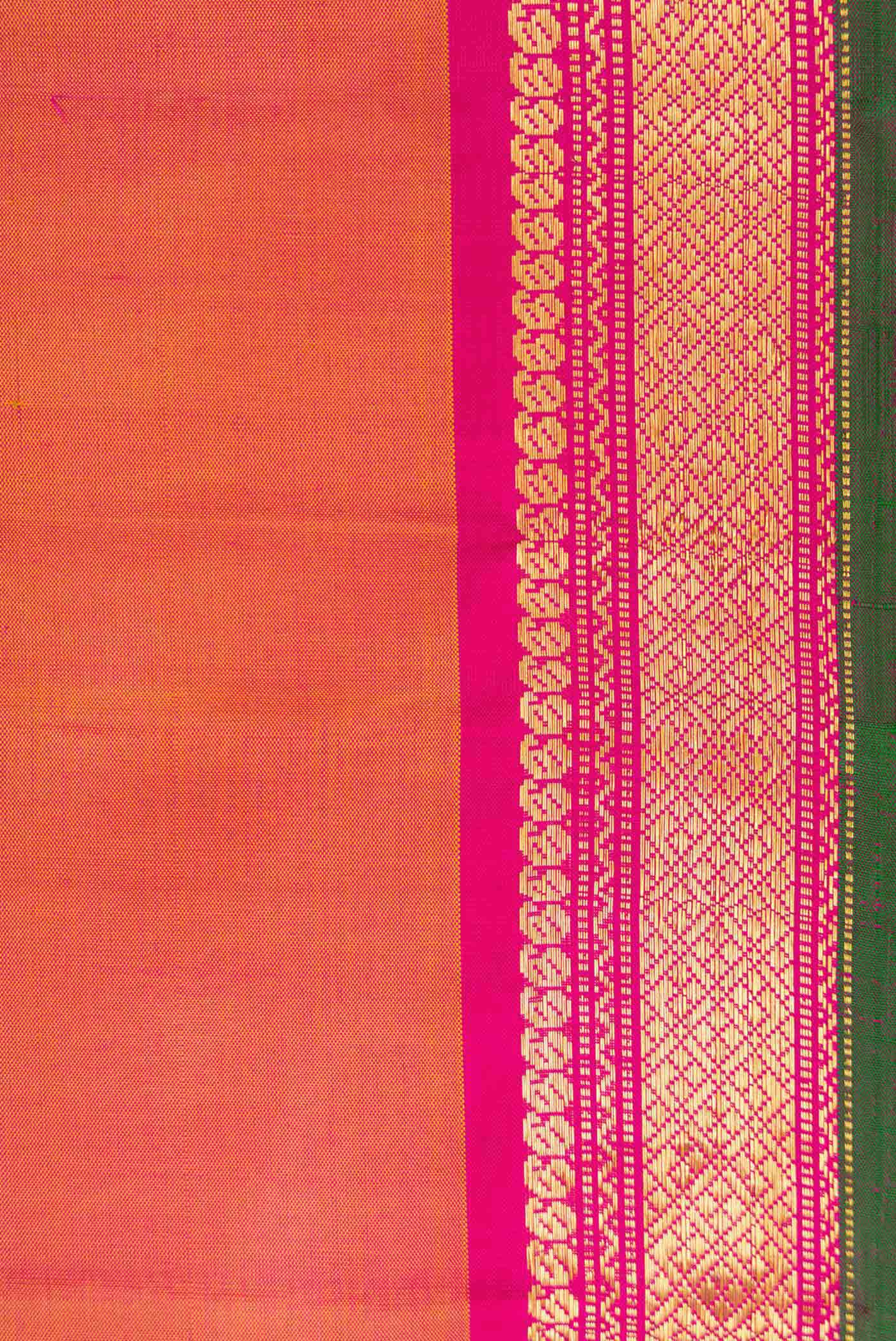 Border image of Coral Dual Tone Kanjivaram Silk Saree with Plain Body and Zari Border. 