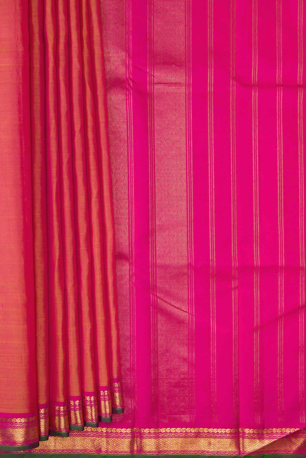 Pleats and pallu of Coral Dual Tone Kanjivaram Silk Saree with Plain Body and Zari Border. 