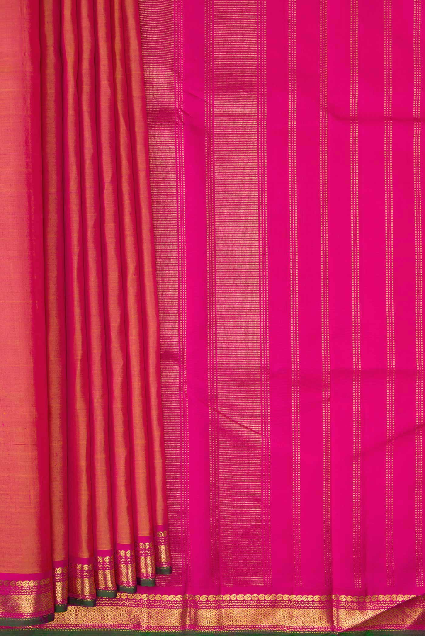 Pleats and pallu of Coral Dual Tone Kanjivaram Silk Saree with Plain Body and Zari Border. 