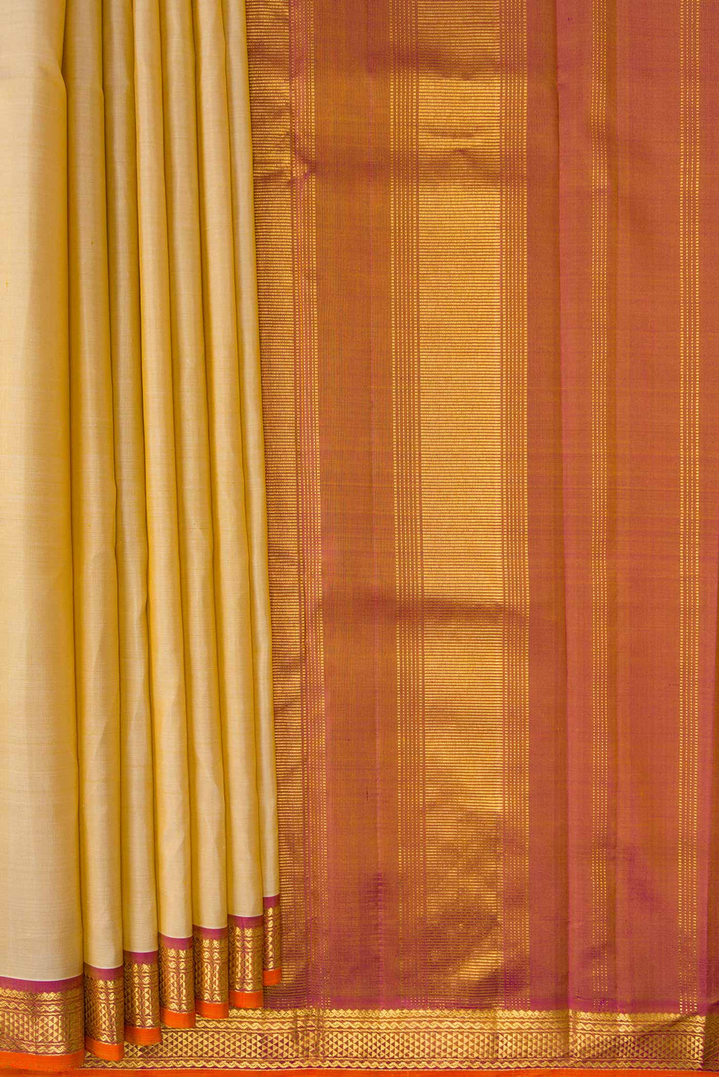 Pleats and pallu of Beige Dual Tone Kanjivaram Silk Saree with Plain Body and Thread Border. 