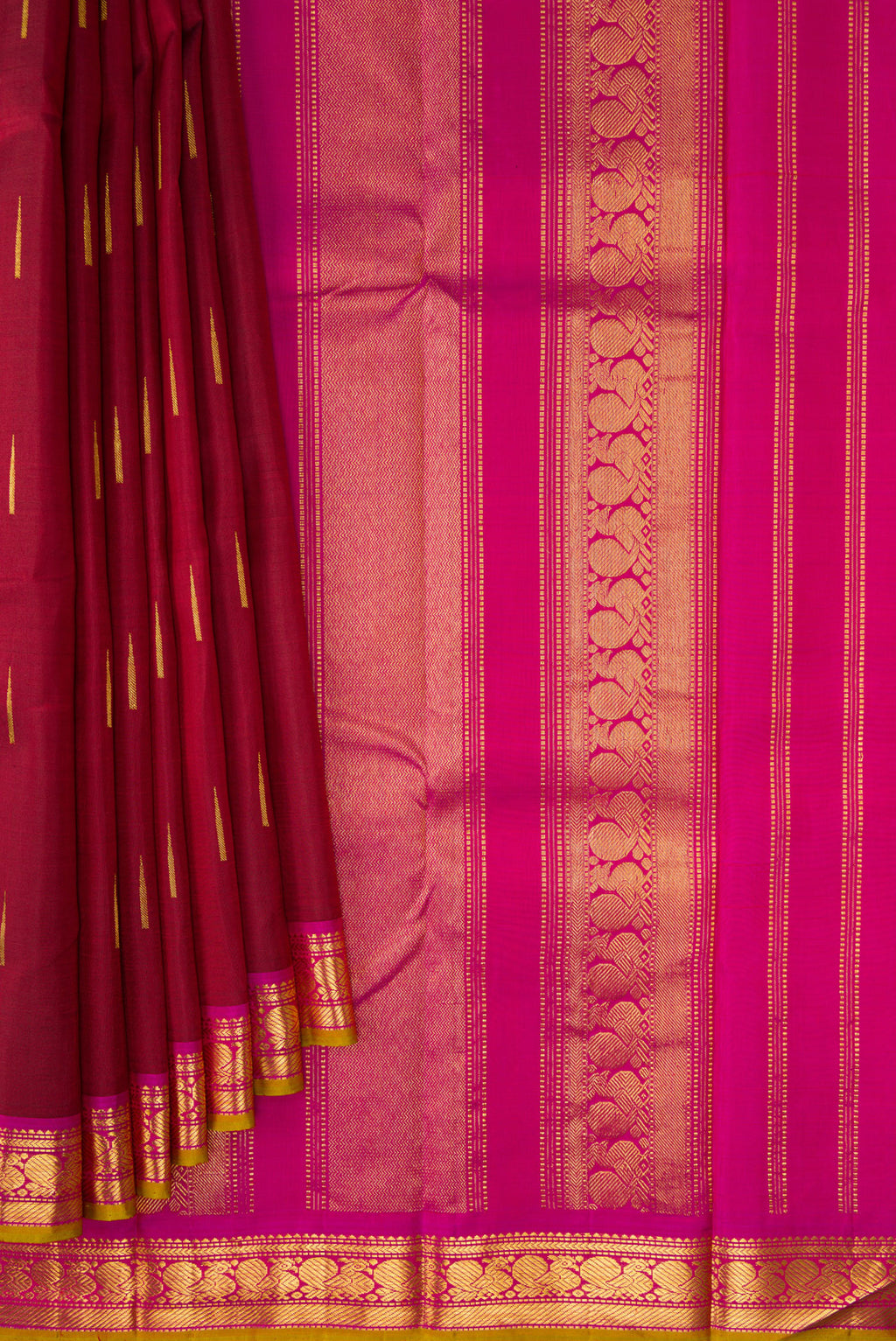 Pleats and pallu of Maroon Dual Tone Kanchipuram Silk Saree with Zari Butta on the body and Zari Border. 