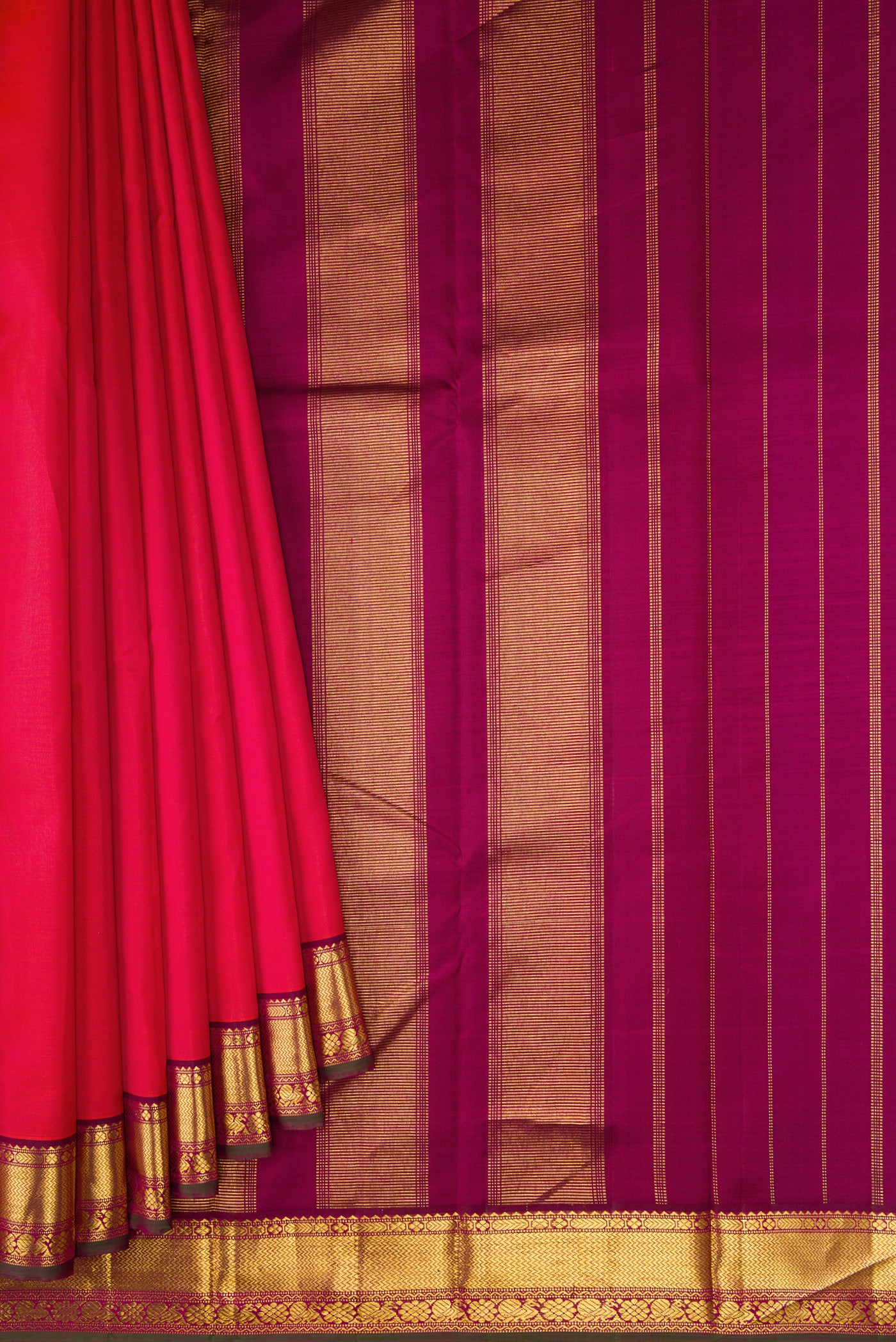 Pleats and pallu of Pure Silk Pure Zari Dark Pink Dual Tone Kanchipuram Saree with Plain Body and Zari Border. 