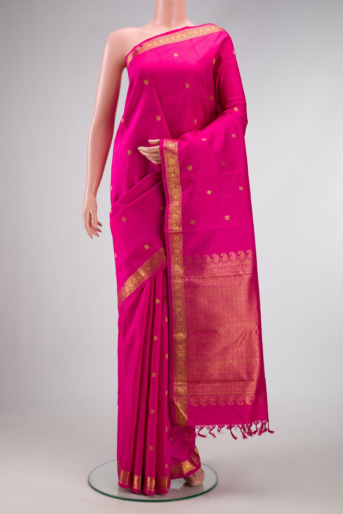 Pink Dual Tone Kanchipuram Silk Saree with Zari Butta on the body and Zari Border.  displayed on a mannequin