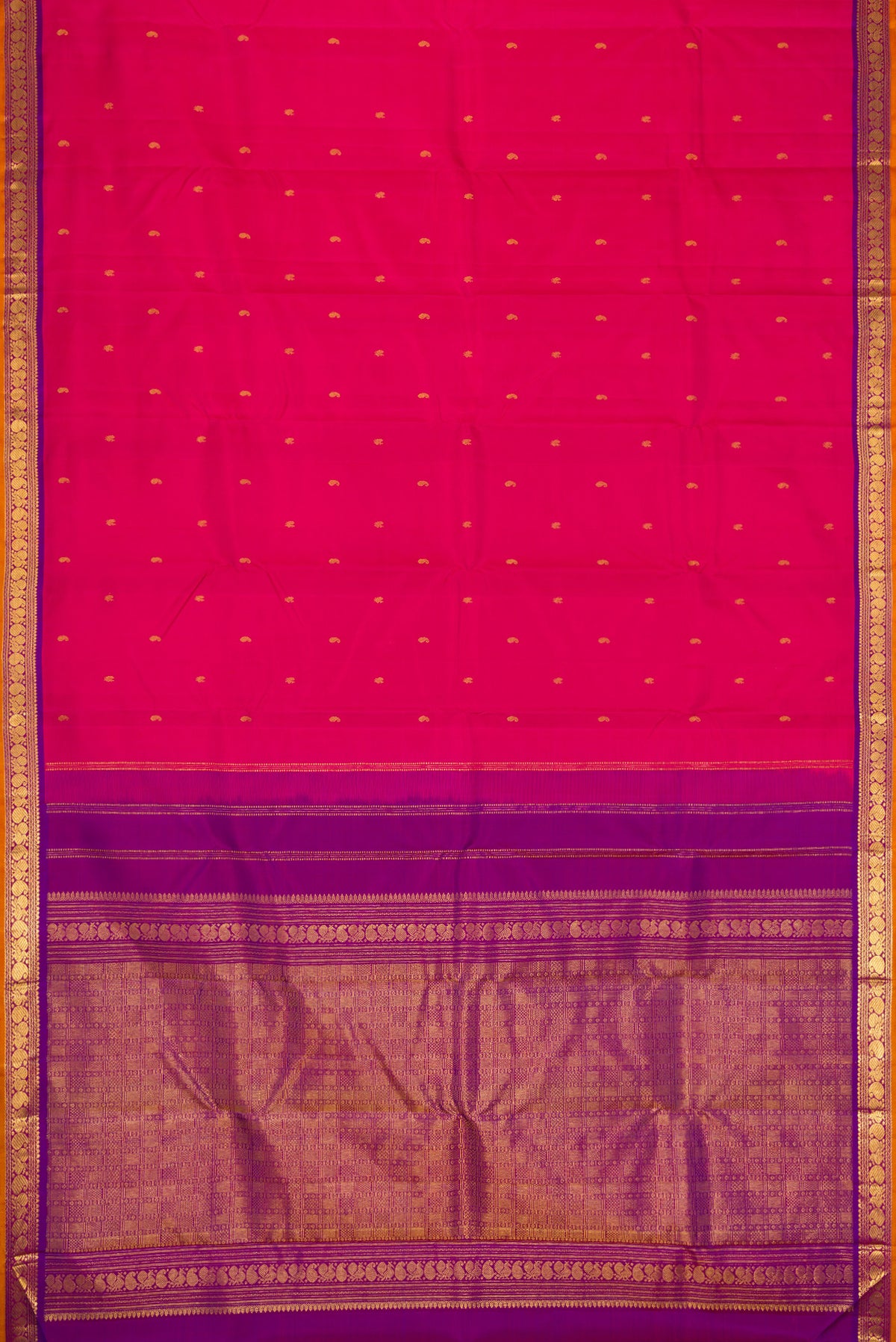 Flat view of Pink Dual Tone Kanchipuram Silk Saree with Zari Butta on the body and Zari Border. 