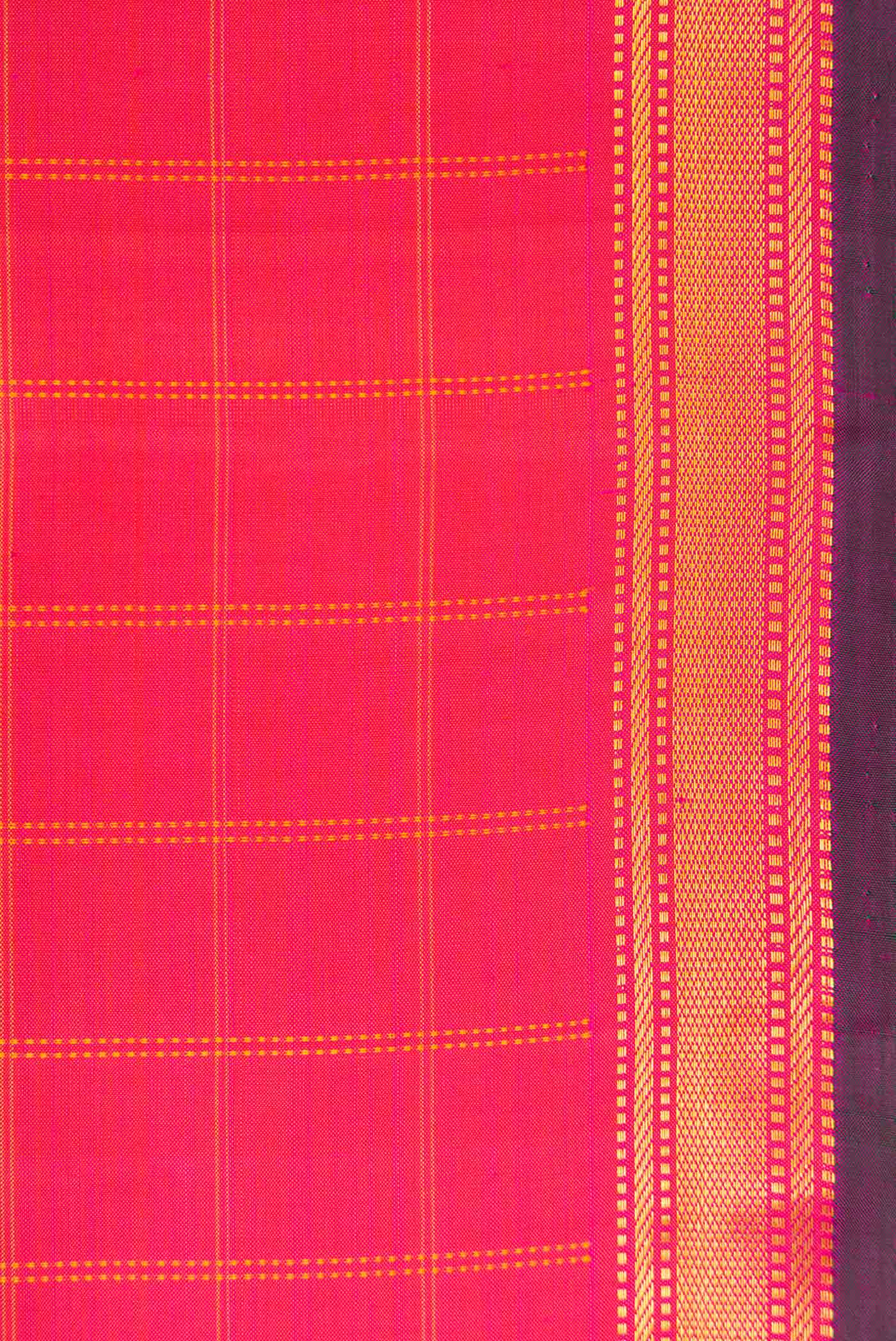 Border image of Orange Dual Tone Kanchipuram Silk Saree with Checked design on the body and Zari Border. 