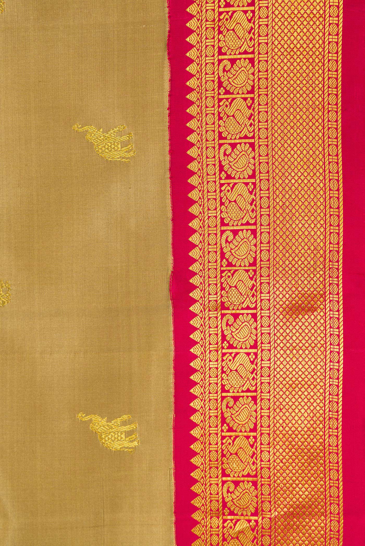 Border image of Dark Beige Dual Tone Kanjivaram Silk Saree with Zari Butta on the body and Zari Border. 