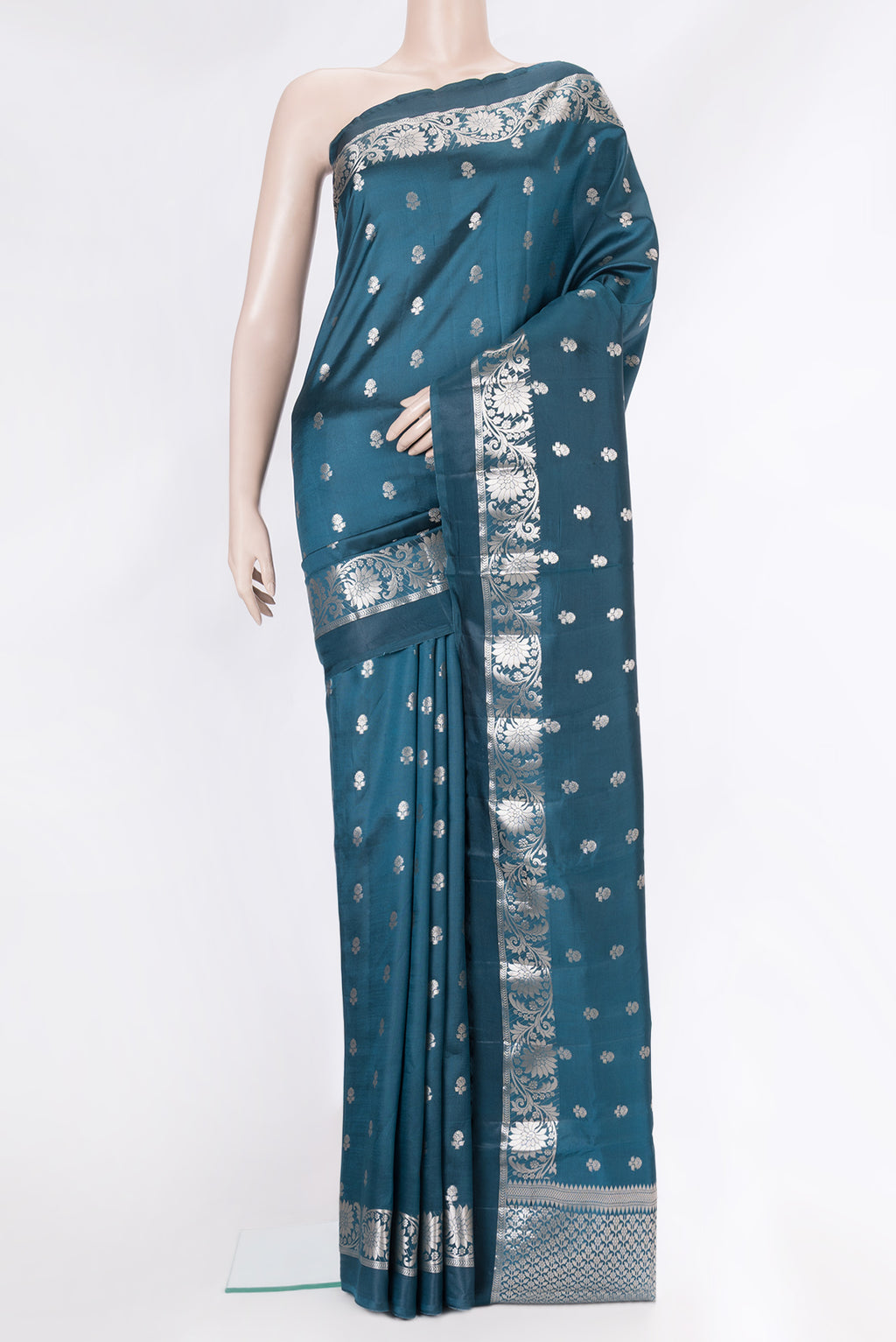 Peacock Blue Dual Tone Tussar Silk Saree with Zari Butta on the body and Fancy Border.  displayed on a mannequin