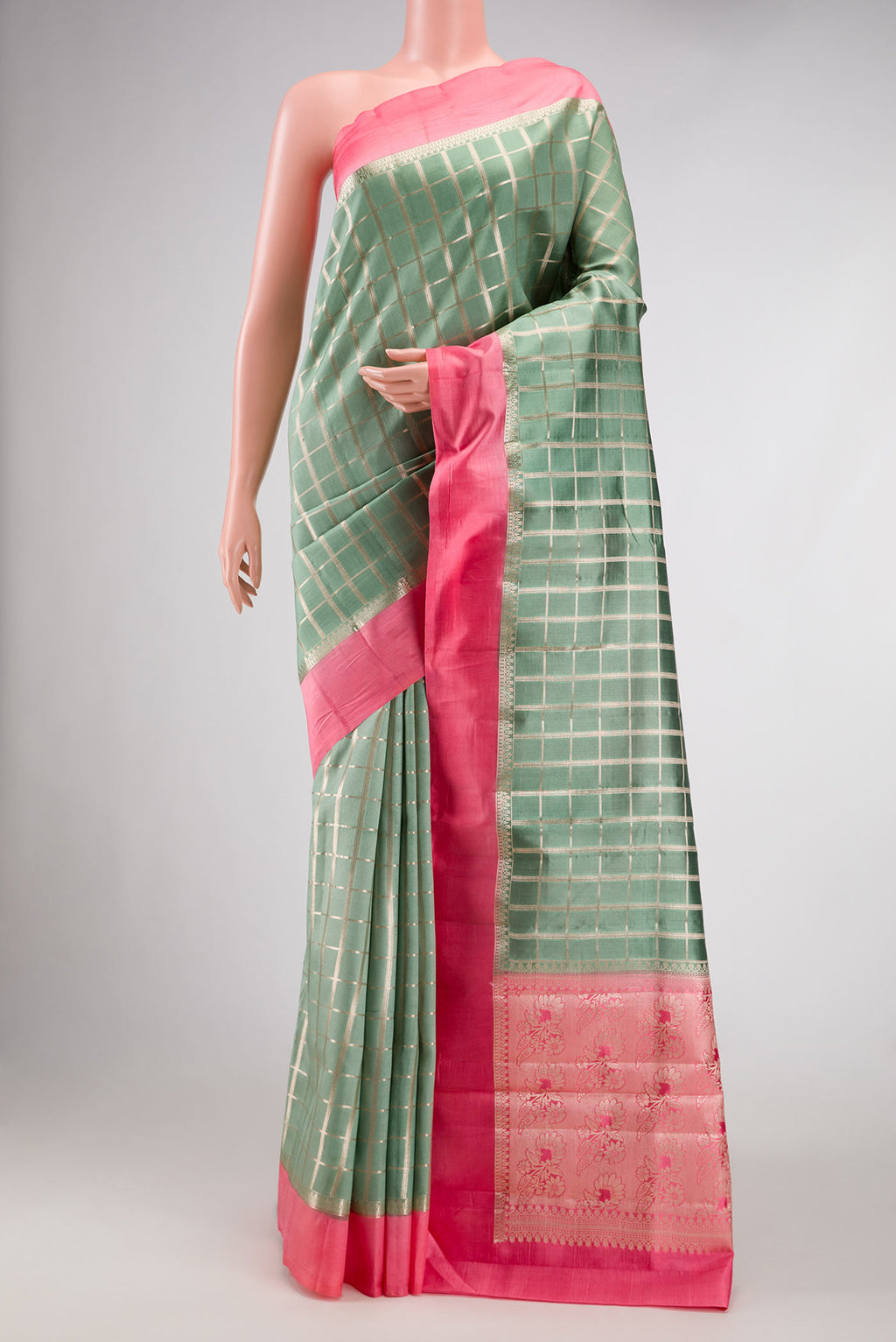Sky Blue Dual Tone Tussar Silk Saree with Zari Brocade on the body and Zari Border.  displayed on a mannequin