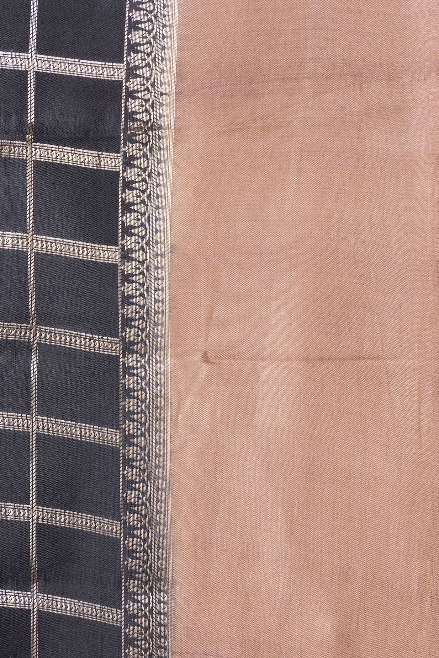 Border image of Black Dual Tone Tussar Silk Saree with Checked design on the body and Zari Border. 