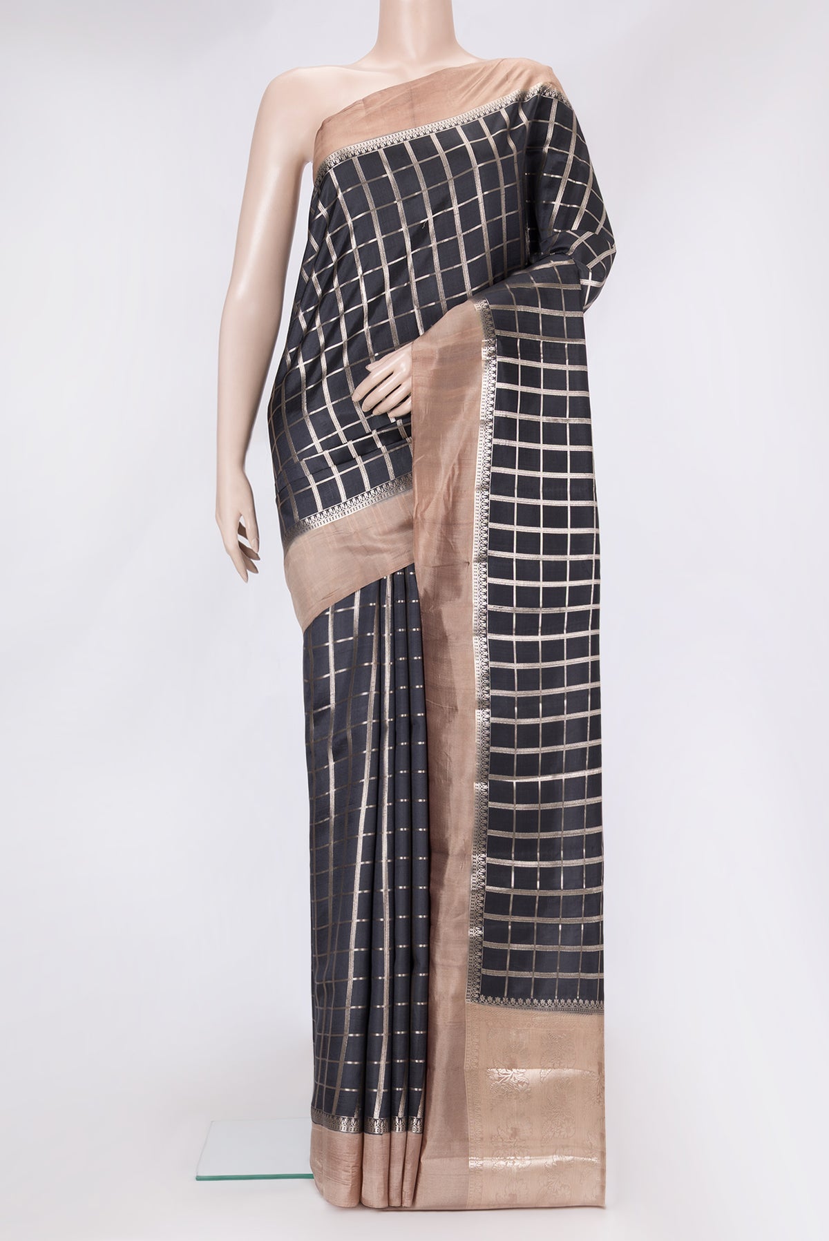 Black Dual Tone Tussar Silk Saree with Checked design on the body and Zari Border.  displayed on a mannequin