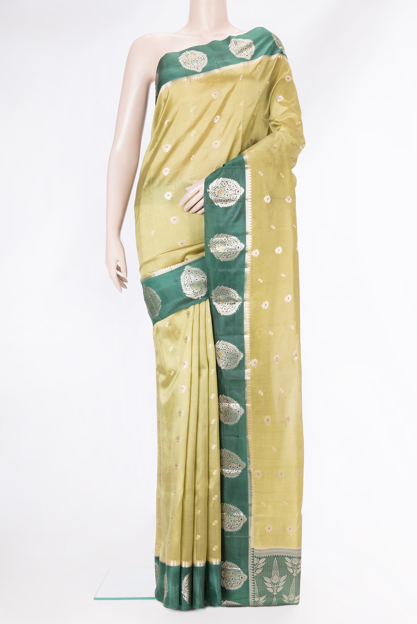 Mehandi Green Dual Tone Tussar Silk Saree with Zari Butta on the body and Fancy Border.  displayed on a mannequin