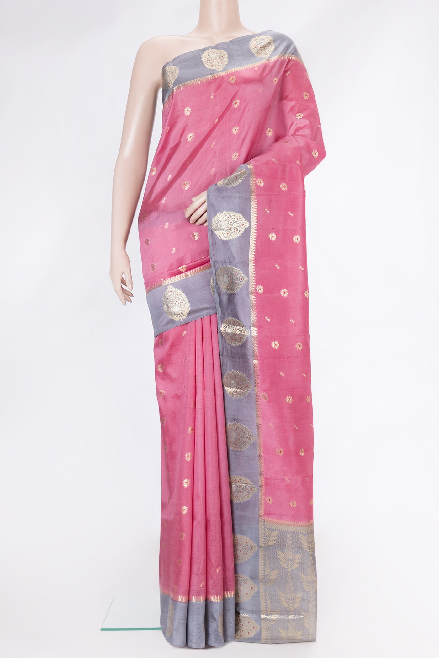 Pink Dual Tone Tussar Silk Saree with Zari Butta on the body and Fancy Border.  displayed on a mannequin