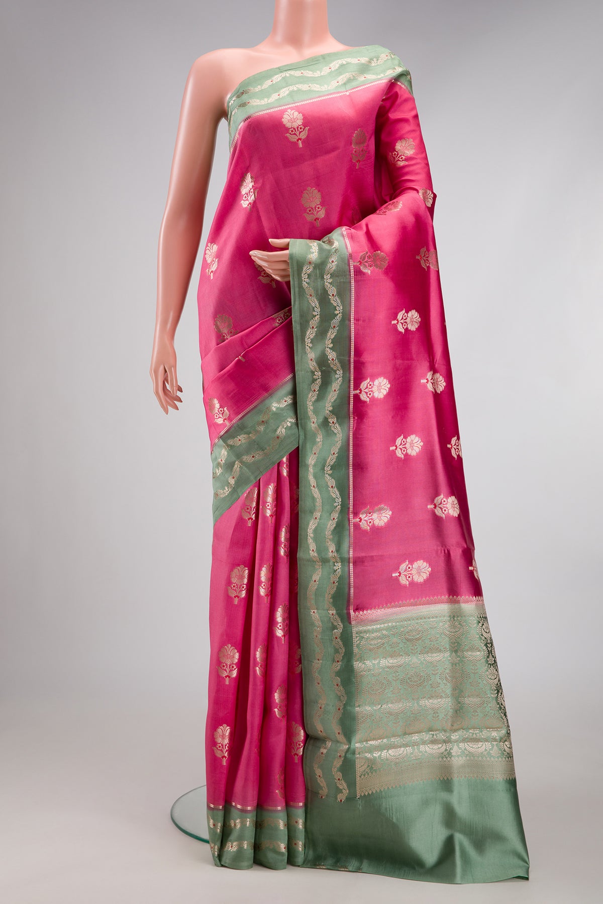 Pink Dual Tone Tussar Silk Saree with Zari Butta on the body and Zari Border.  displayed on a mannequin