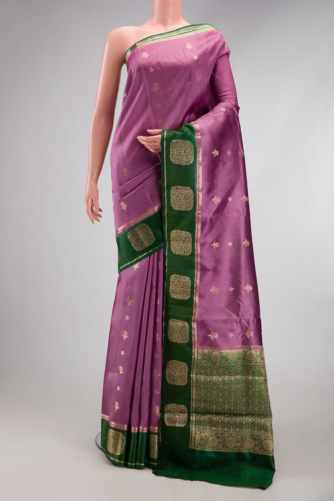 Purple Dual Tone Tussar Silk Saree with Zari Butta on the body and Fancy Border.  displayed on a mannequin