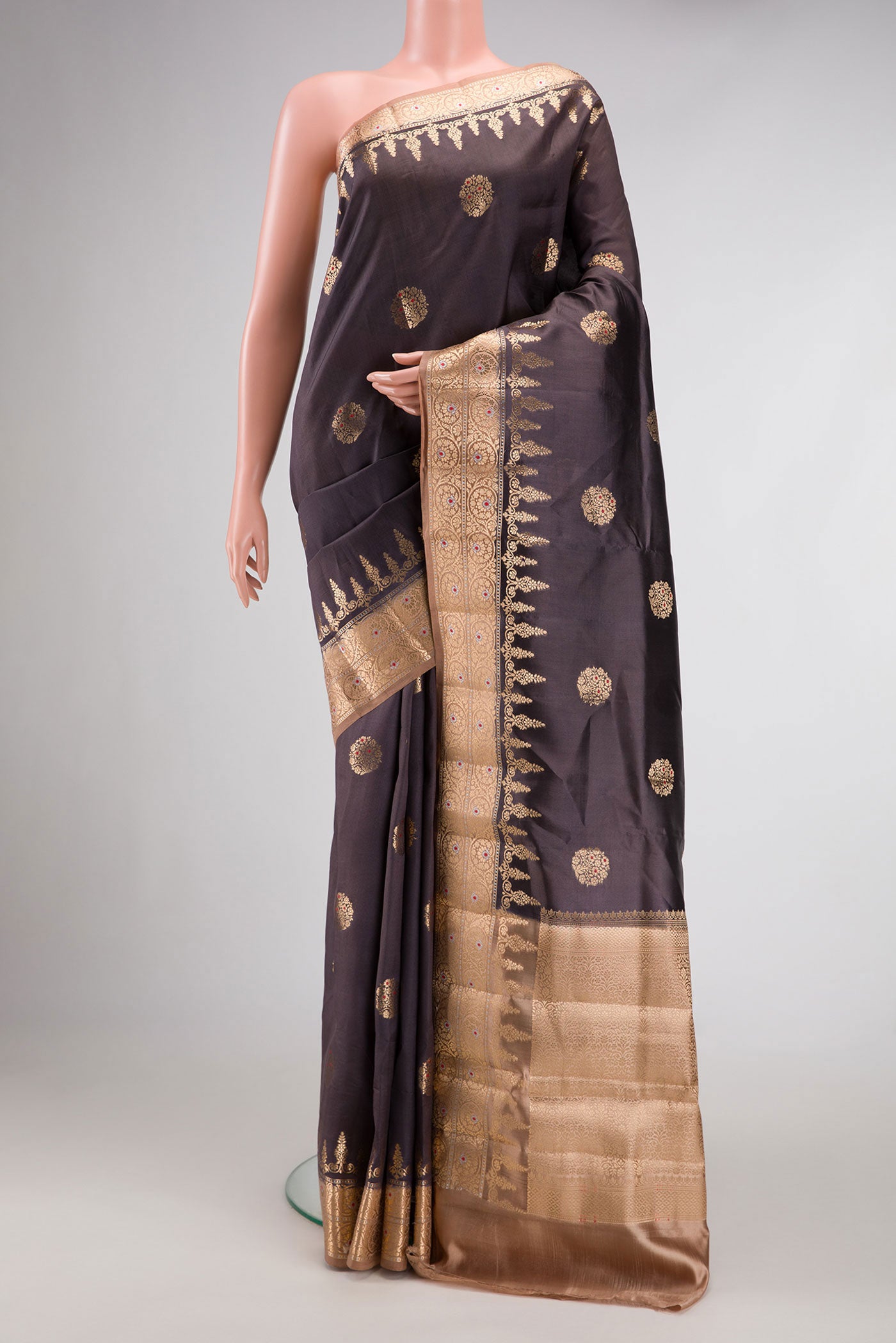 Coffee Brown Dual Tone Tussar Silk Saree with Zari Butta on the body and Zari Border.  displayed on a mannequin