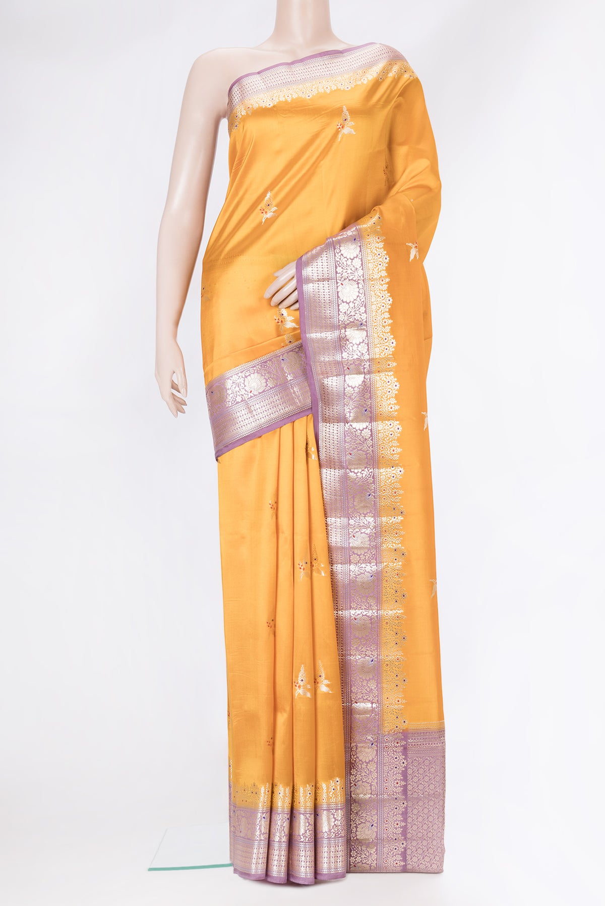 Mustard Dual Tone Tussar Silk Saree with Zari Butta on the body and Fancy Border.  displayed on a mannequin