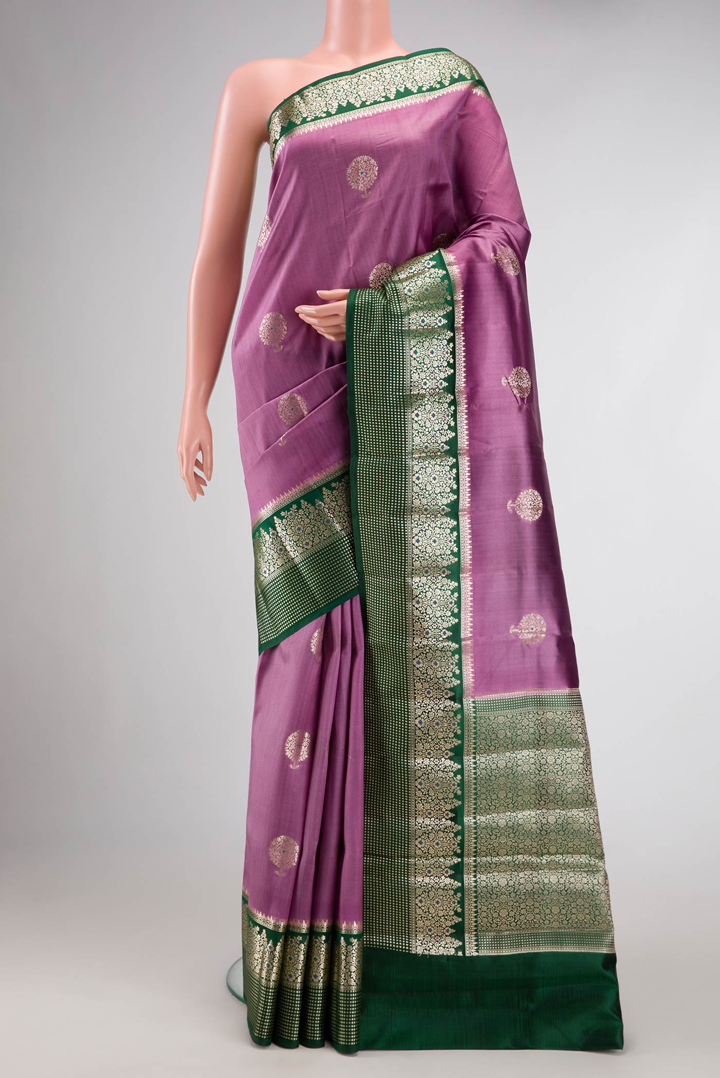 Lavender Dual Tone Tussar Silk Saree with Zari Butta on the body and Zari Border.  displayed on a mannequin